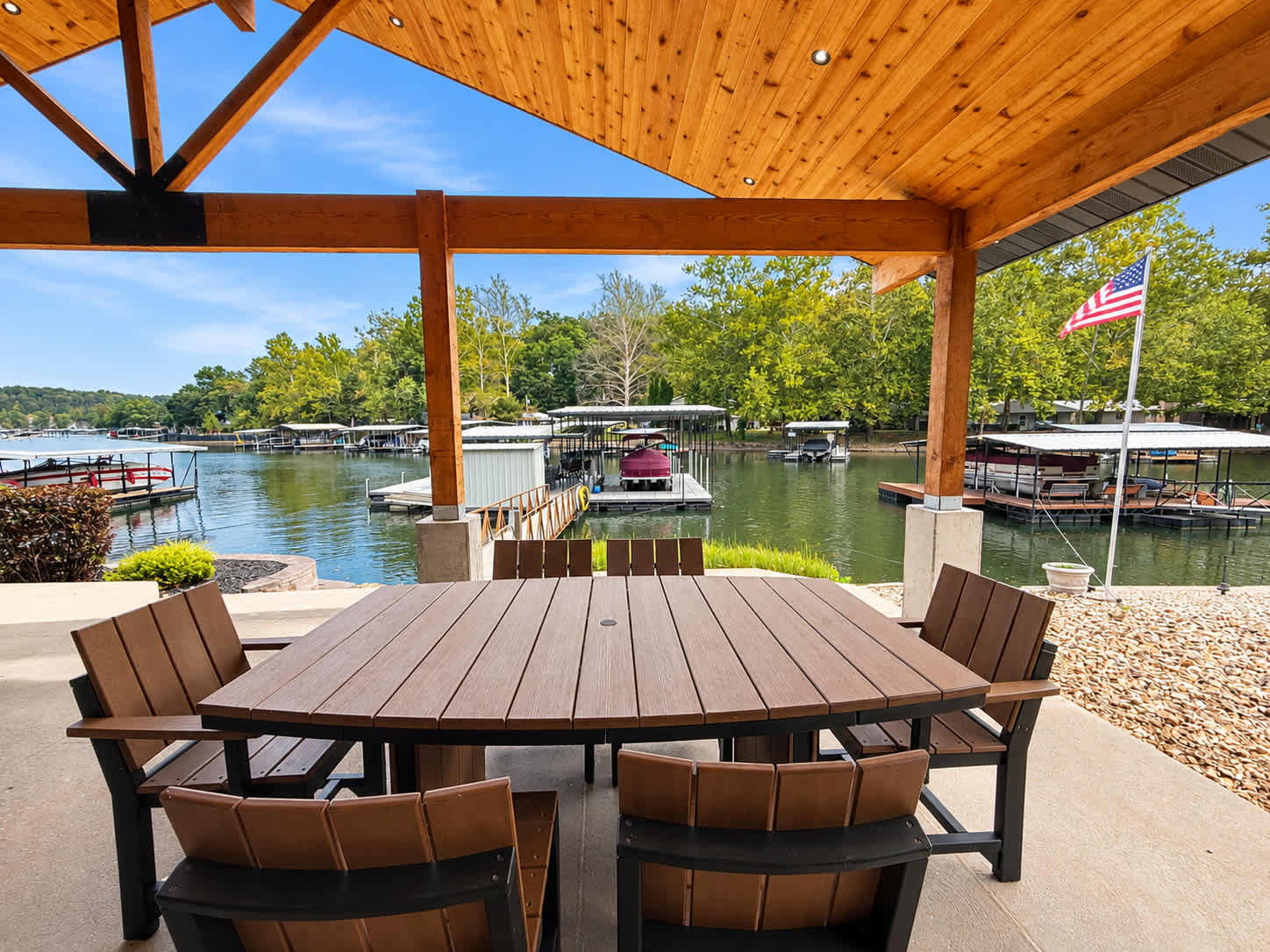 Gather for outdoor meals at the covered patio table with seating for 6 and beautiful lake views​