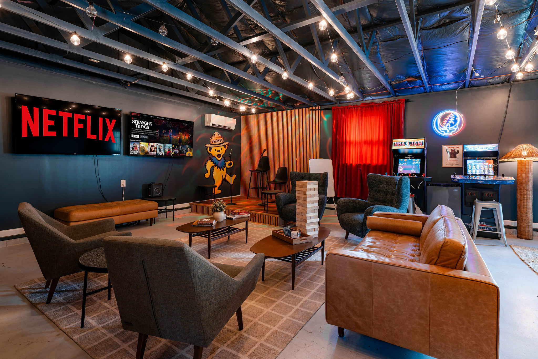 Two large smart TVs make the game room a favorite for watching sports together