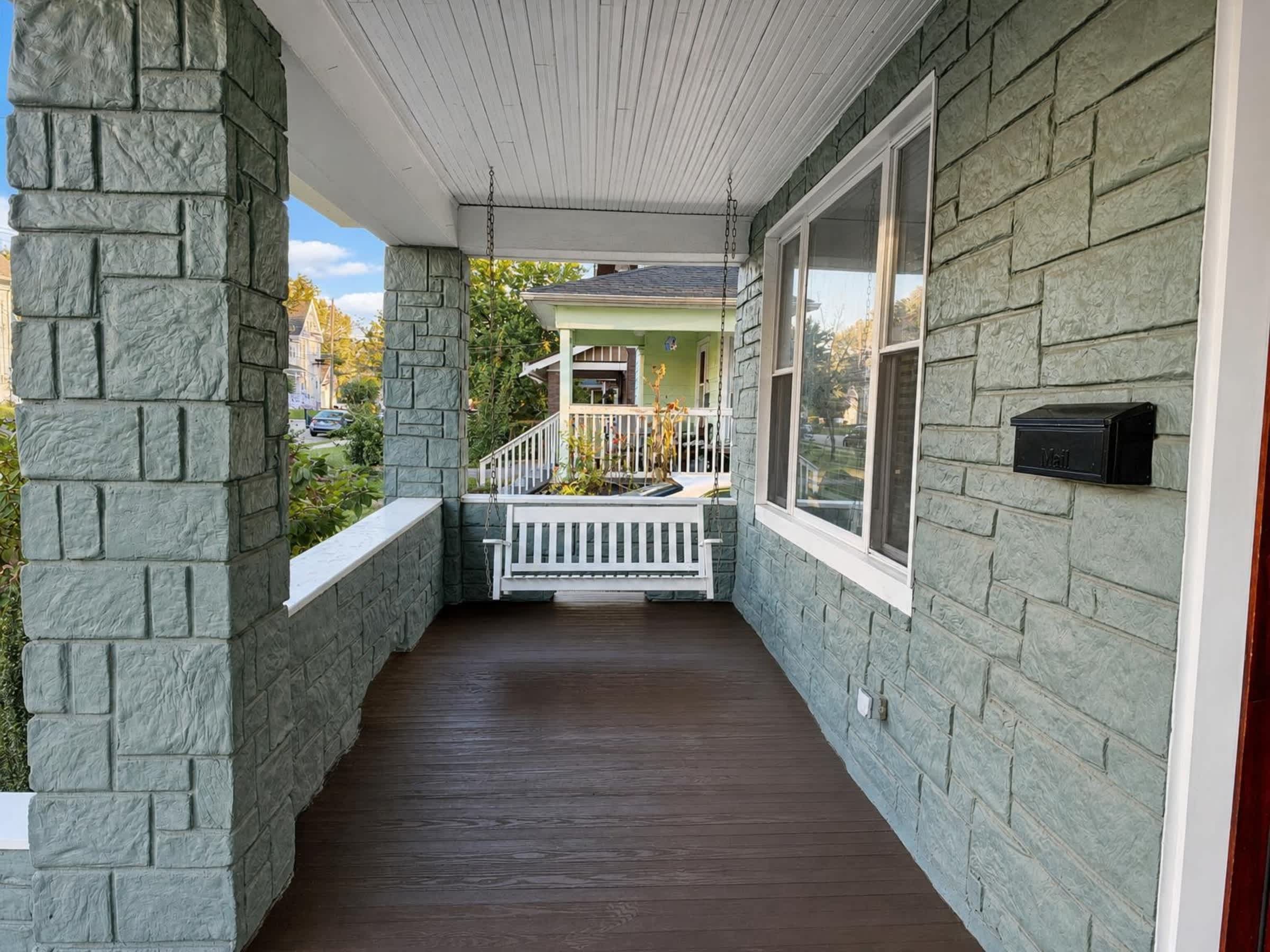 Sip morning coffee or an evening cocktail on the front porch​