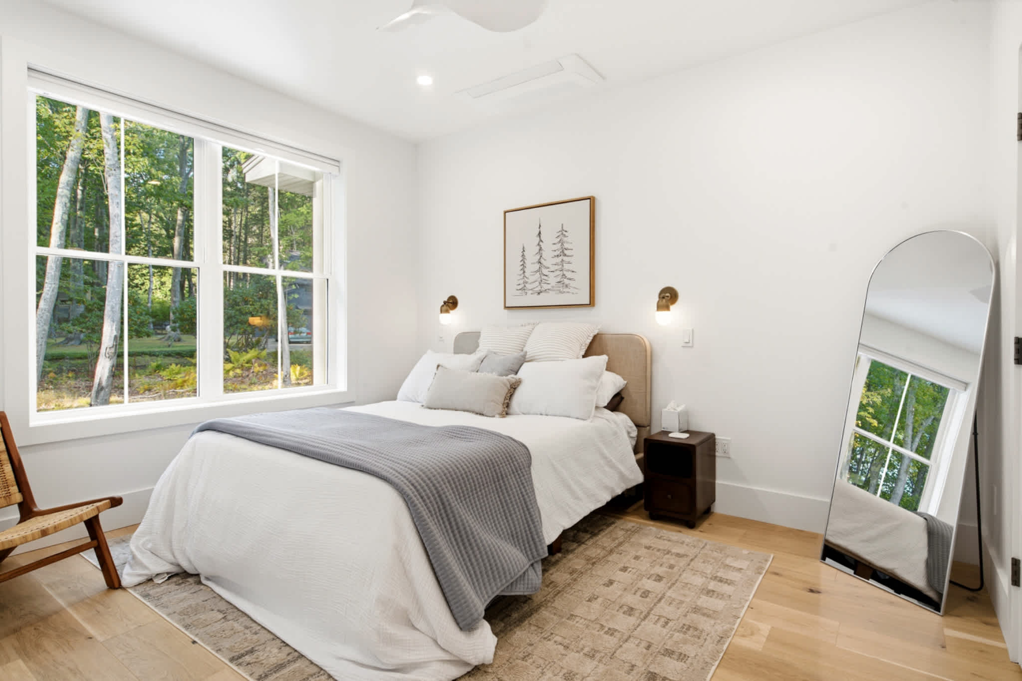 Cozy queen bedroom featuring a Smart TV for relaxing evenings