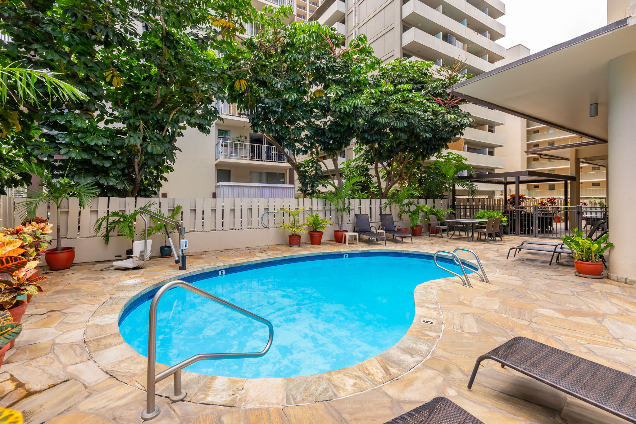 Relax poolside with comfortable lounge chairs, perfect for soaking up the sun