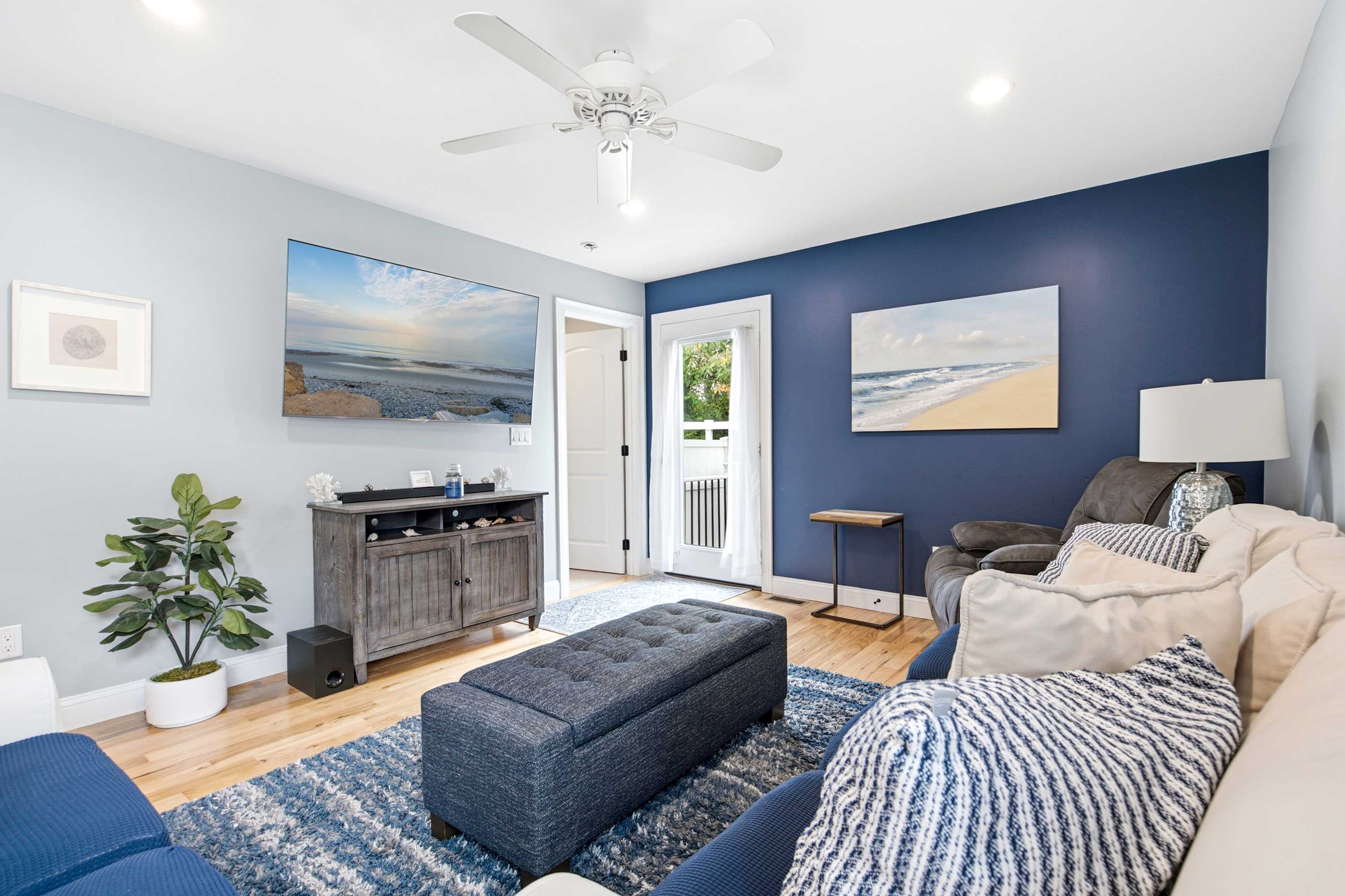 Unwind in the inviting living room & stream your favorites on the smart TV​