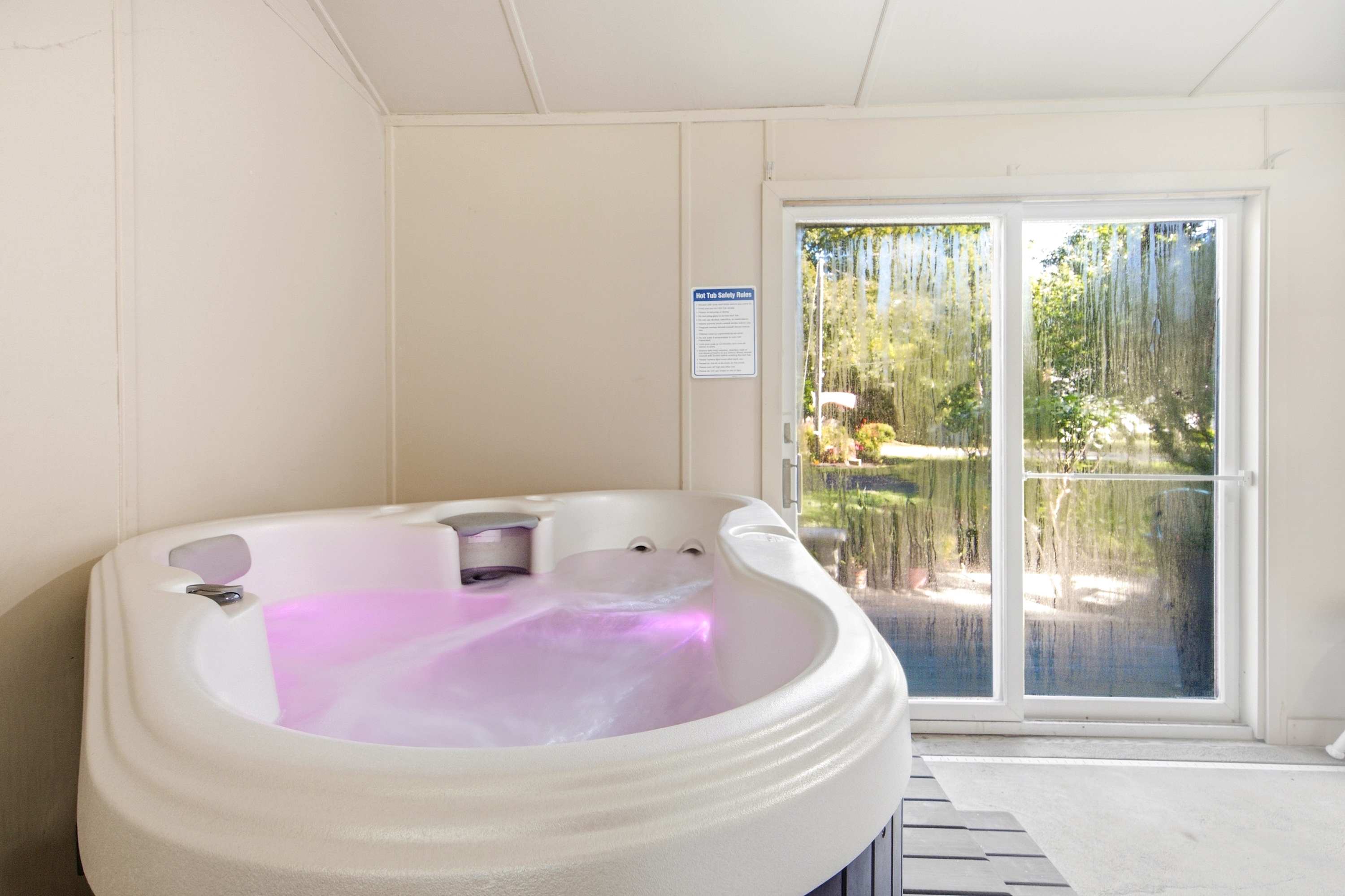 Bask in bubbling bliss in the private hot tub​