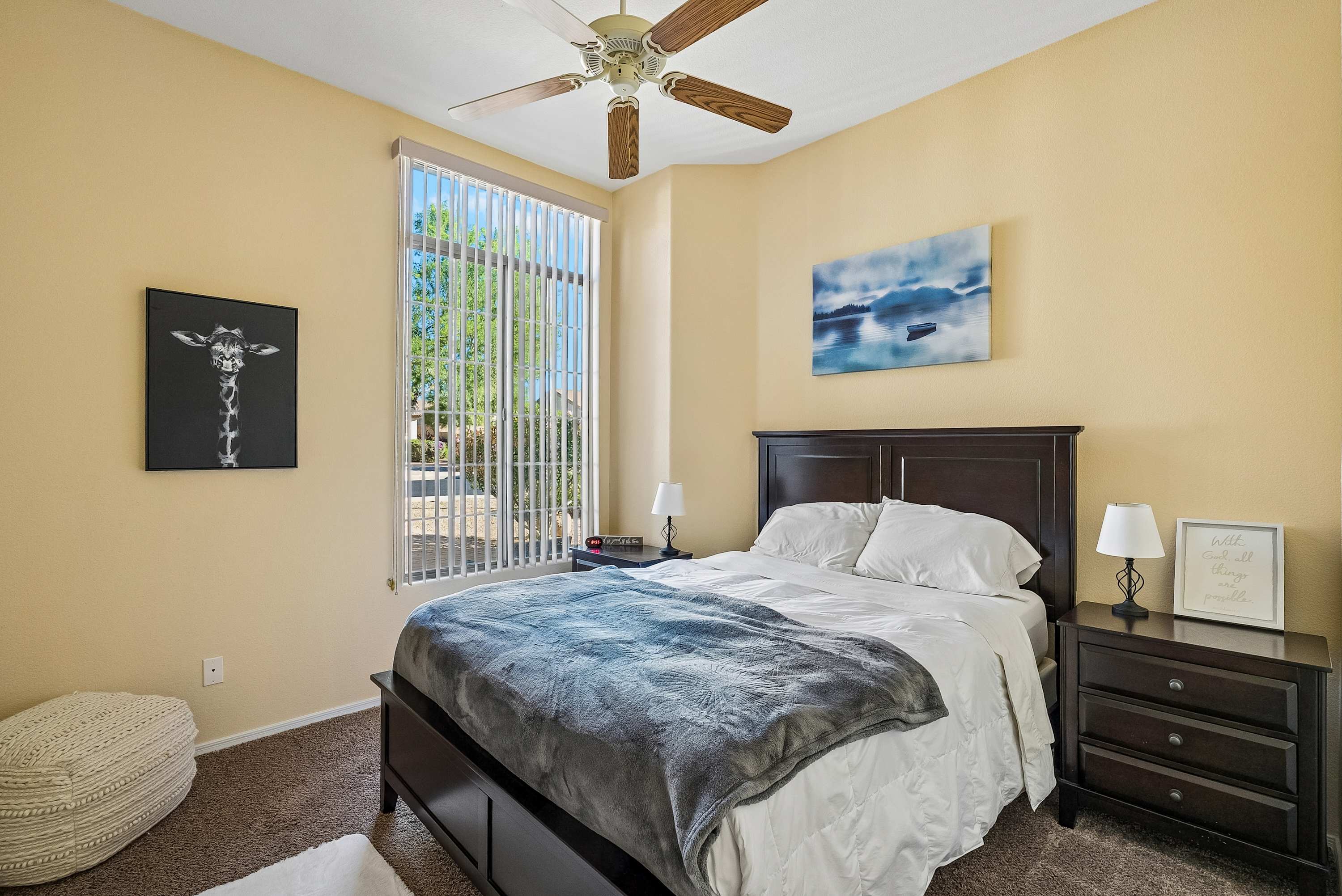 Rest easy in the inviting queen bedroom, your own cozy corner of comfort