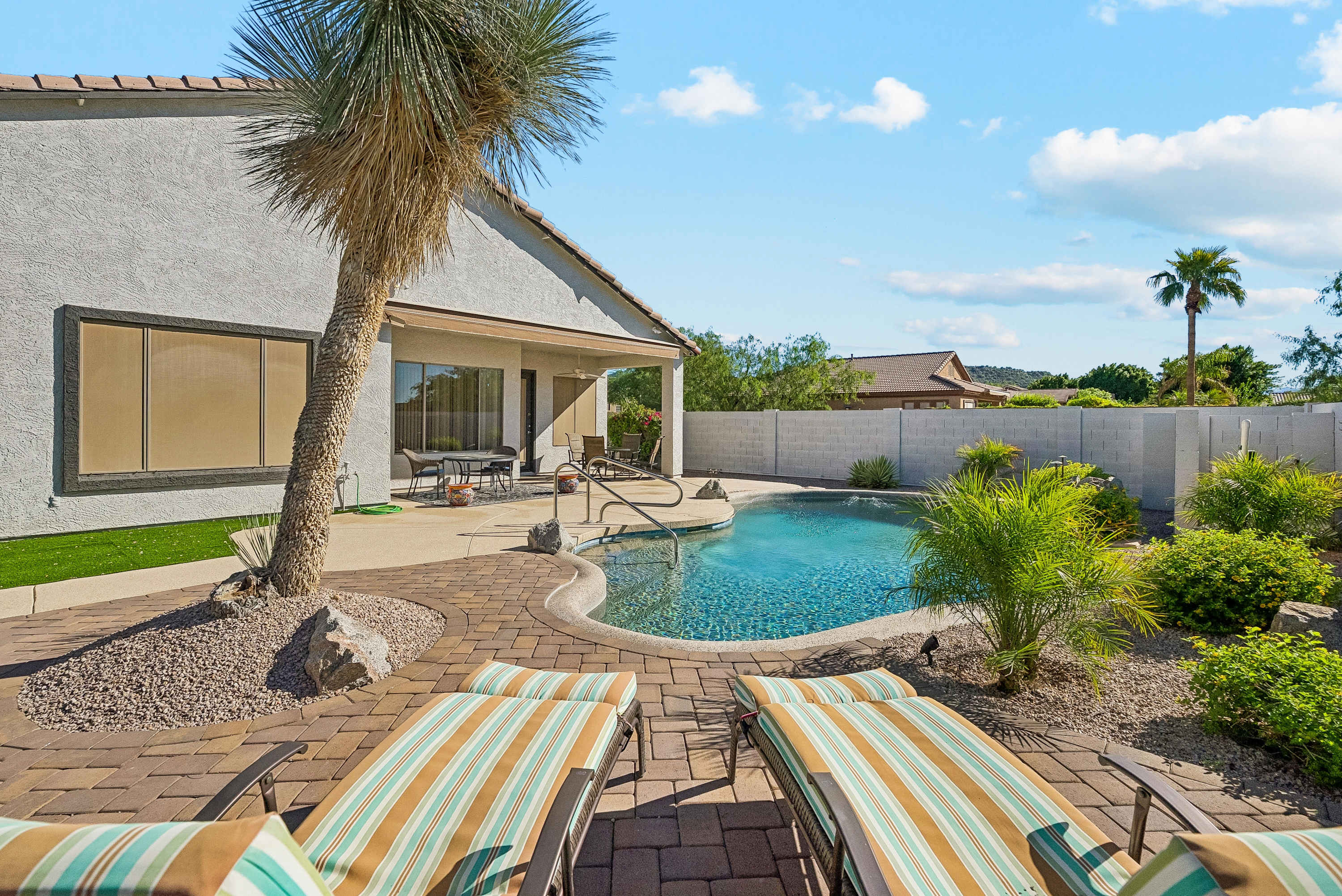Your perfect poolside escape awaits, with sunshine and relaxation just steps away