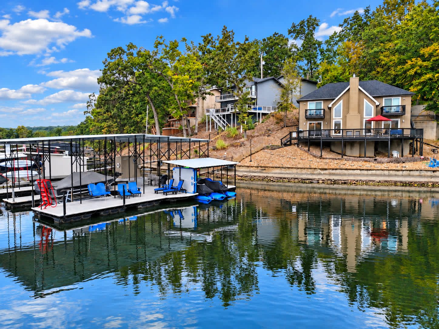 Experience lakeside living with sweeping water views, a charming lakefront home, and a private dock for enjoying time by the water​
