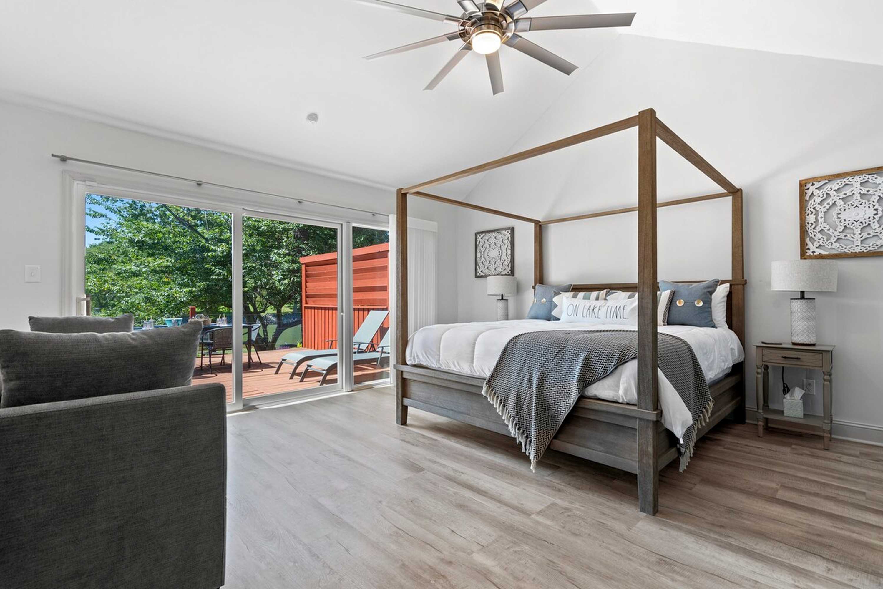 The main-floor king suite boasts a twin sleeper sofa, deck access, & an enuite​.