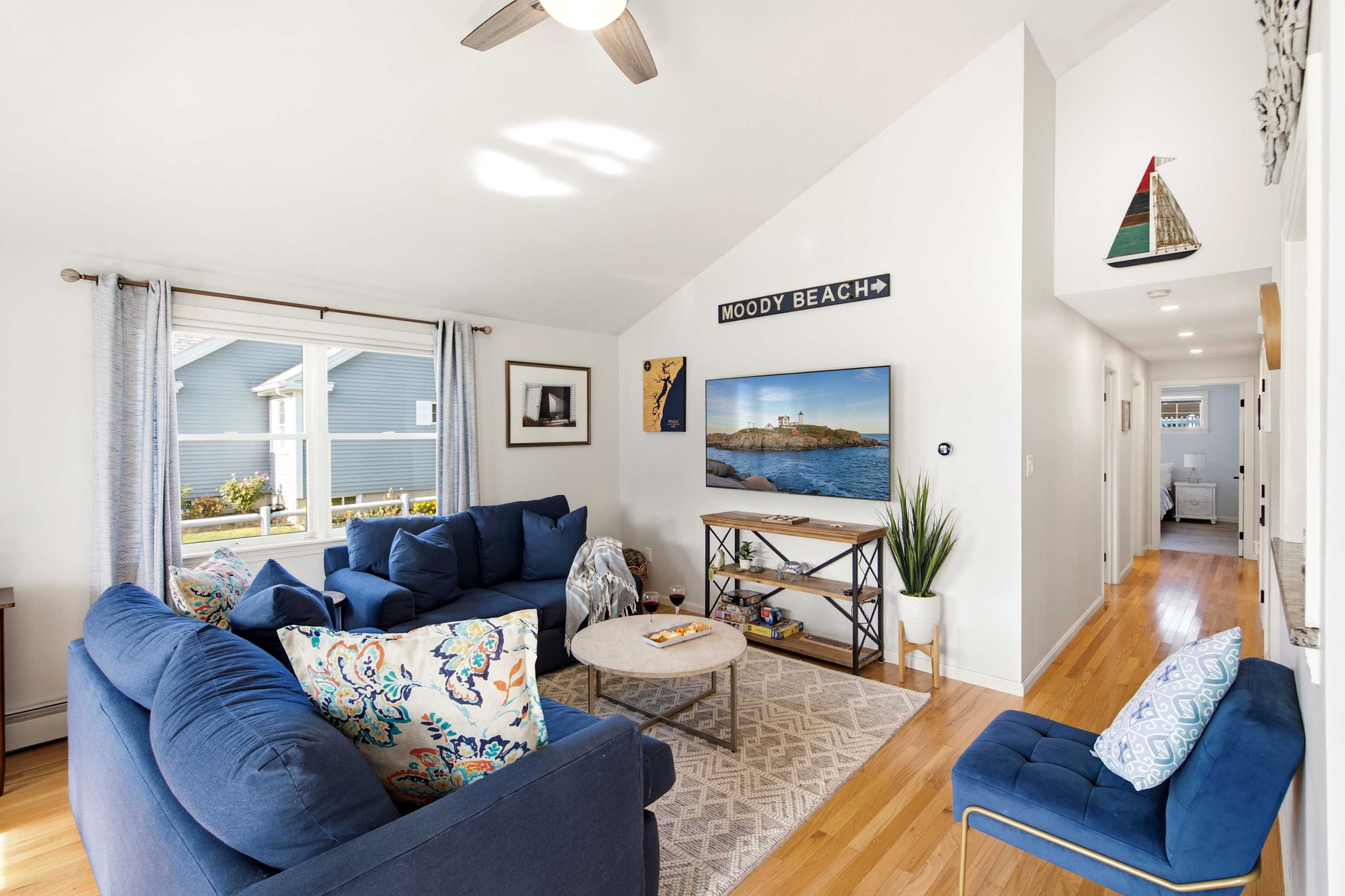 Unwind in the inviting living room & stream your favorites on the smart TV​.