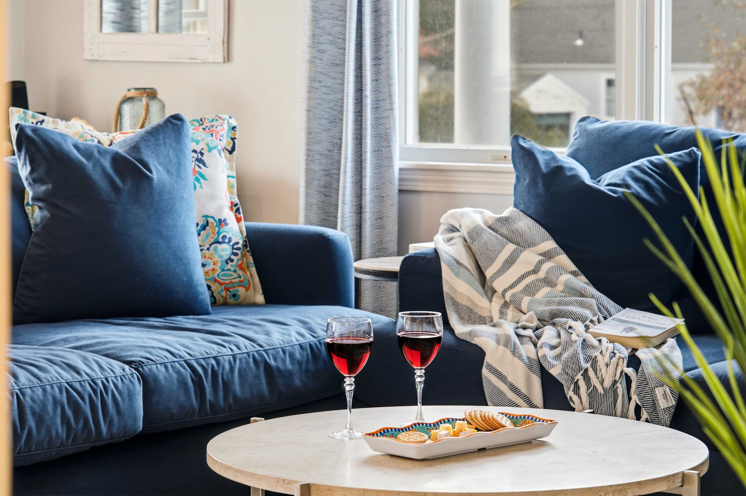 Unwind in the inviting living room & stream your favorites on the smart TV​.