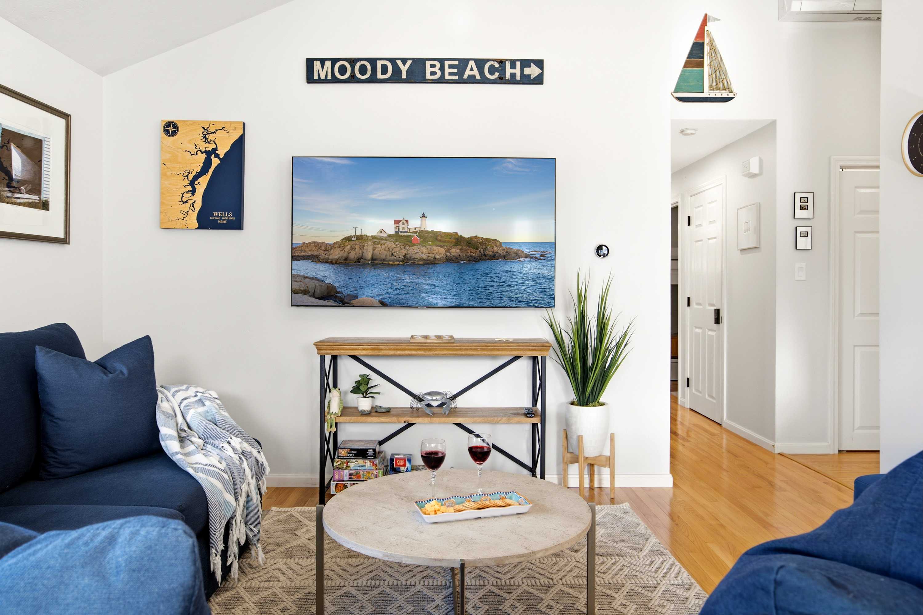 Unwind in the inviting living room & stream your favorites on the smart TV​.