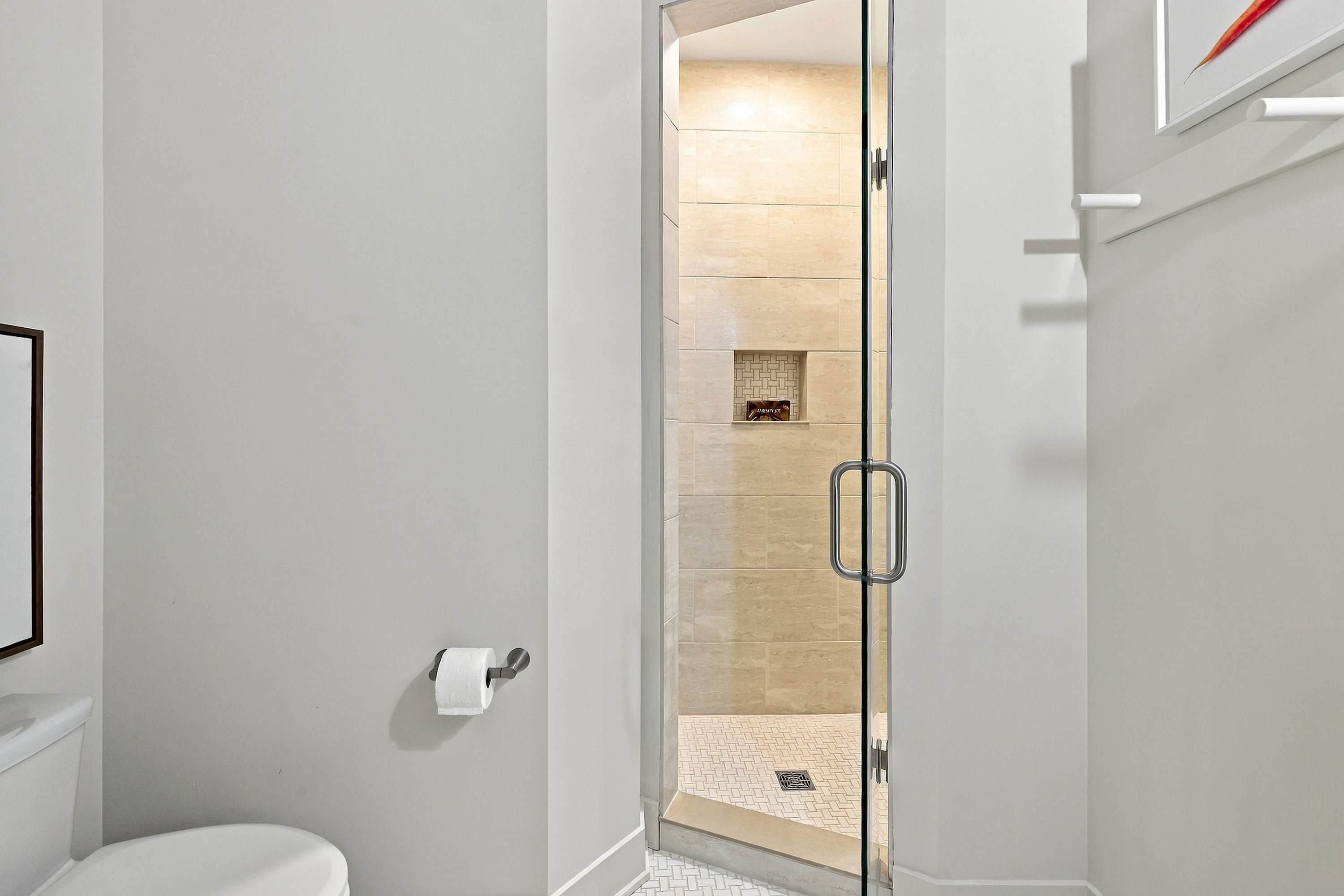 Pack light. The amenity kit is already in the shower.