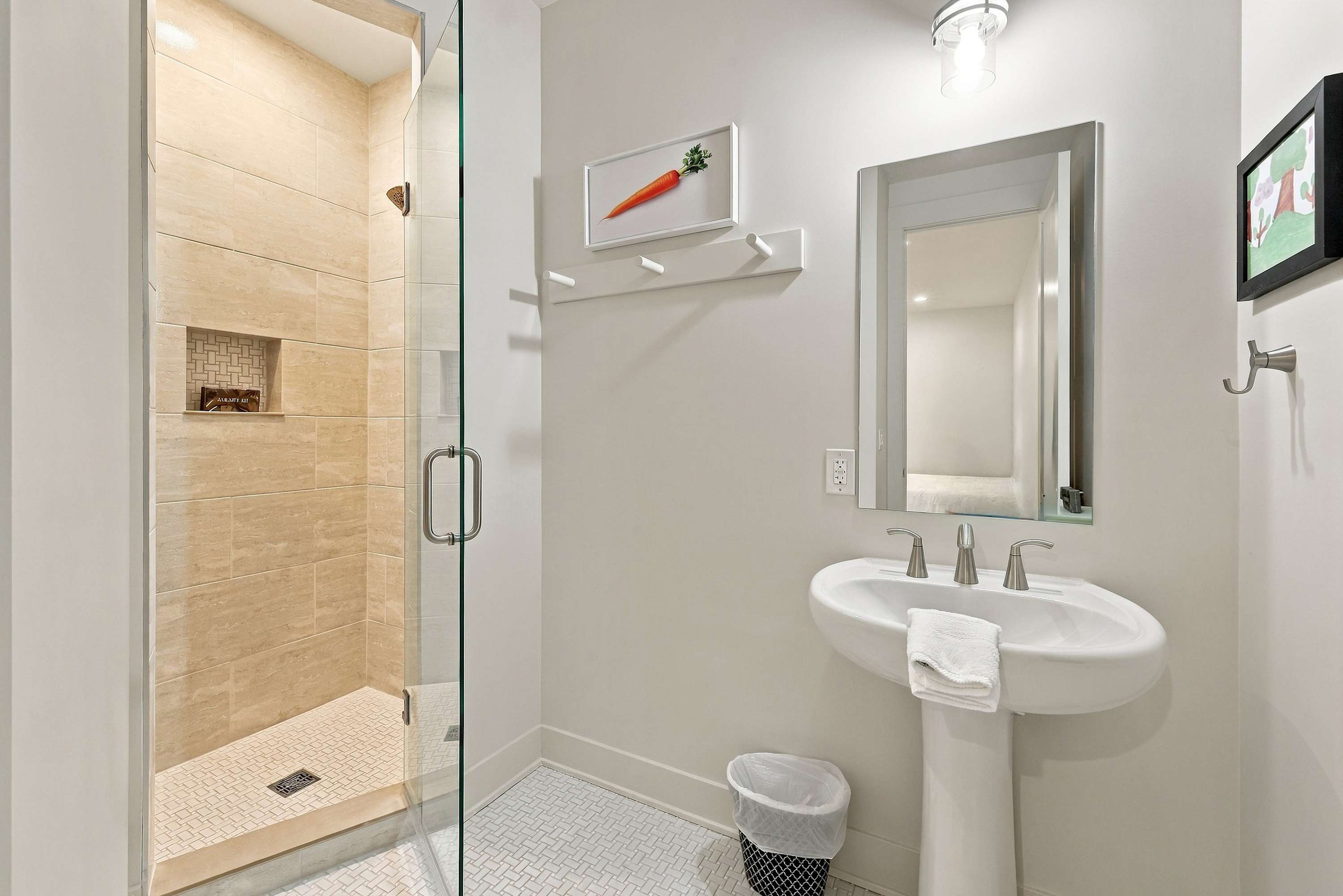 Hang your towel on a peg, rinse off, and head back out to the patio.