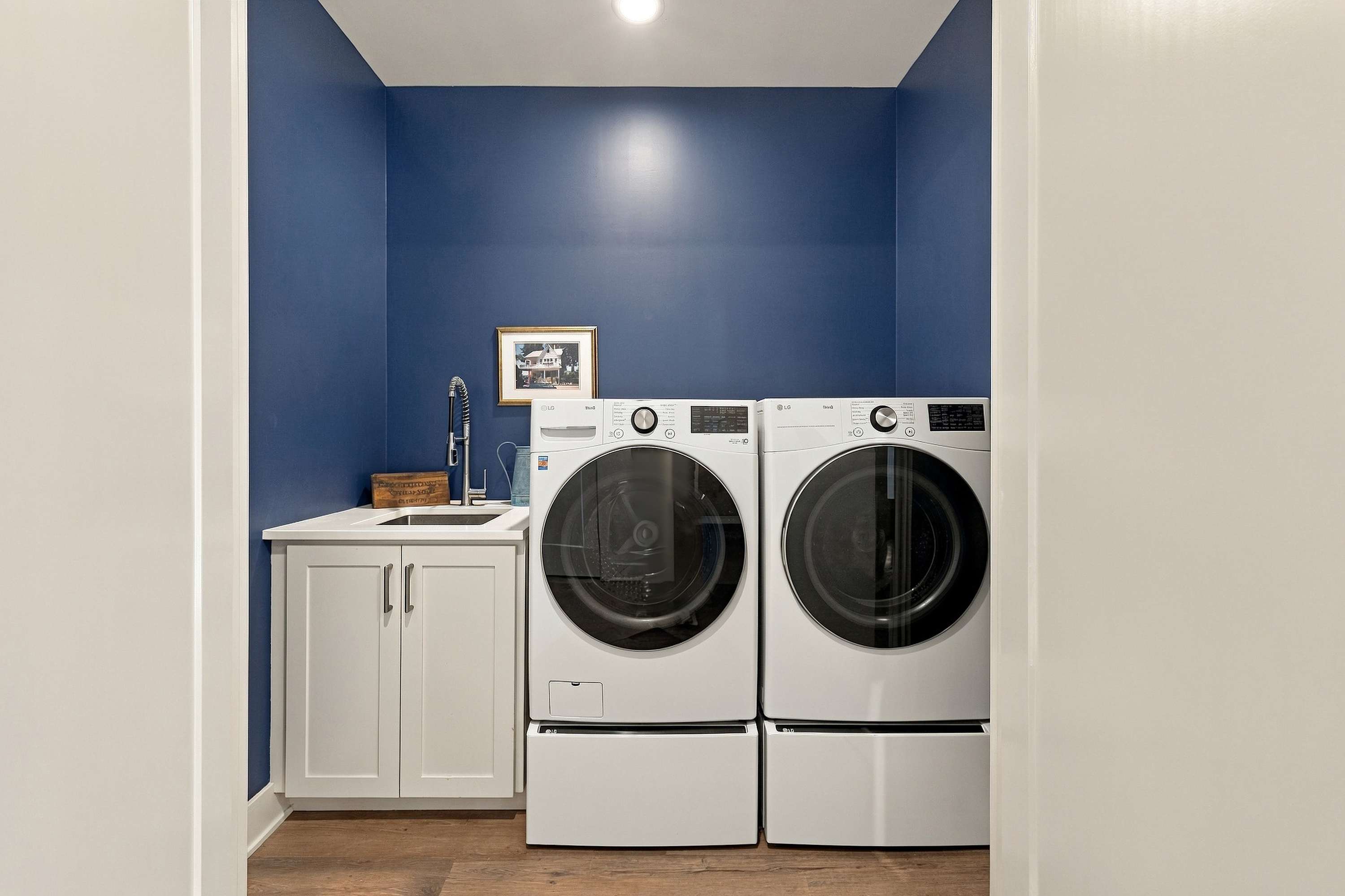 Laundry room with a washer, dryer, and room to fold.