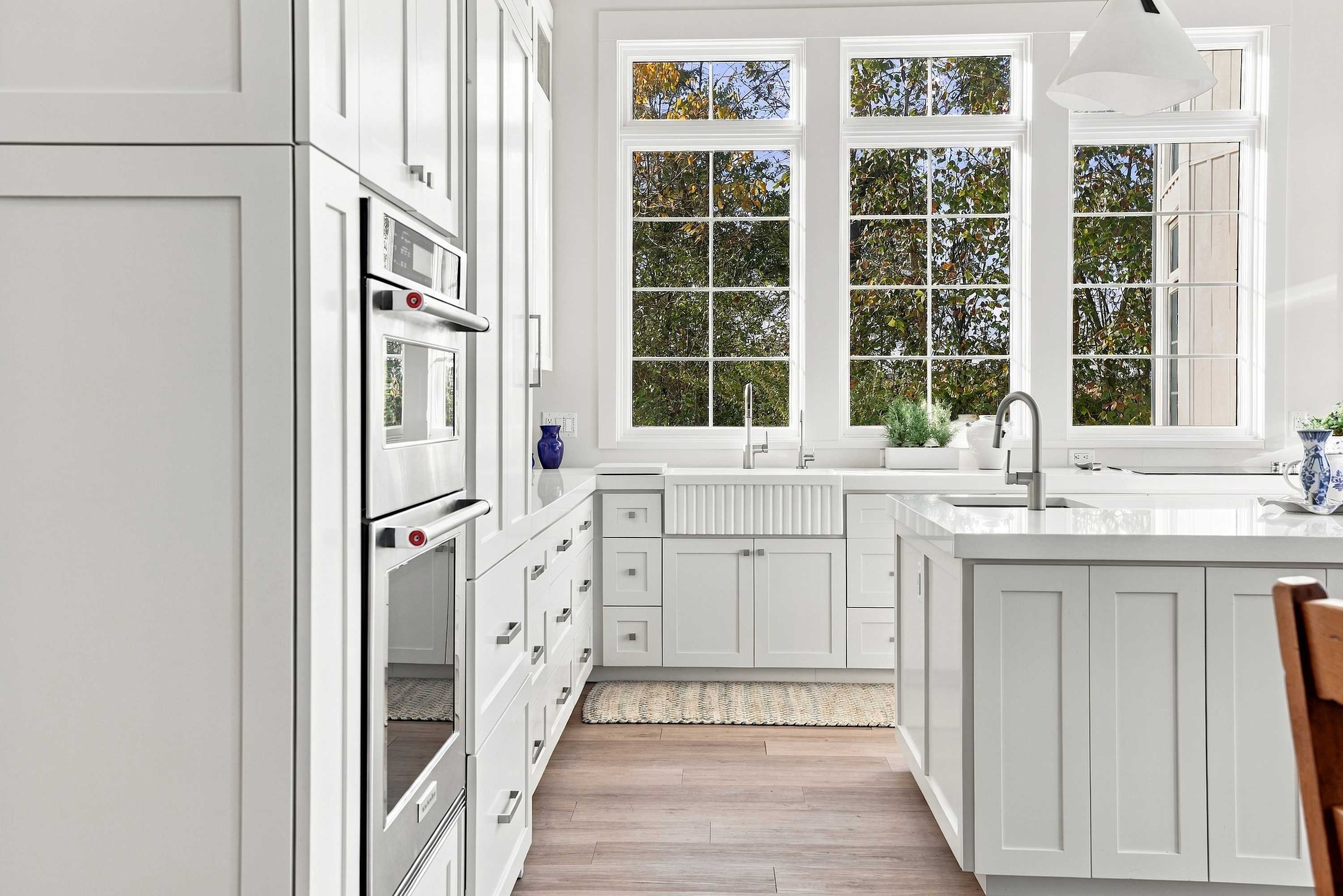 Harbor Country kitchen with stainless appliances and a fluted sink.