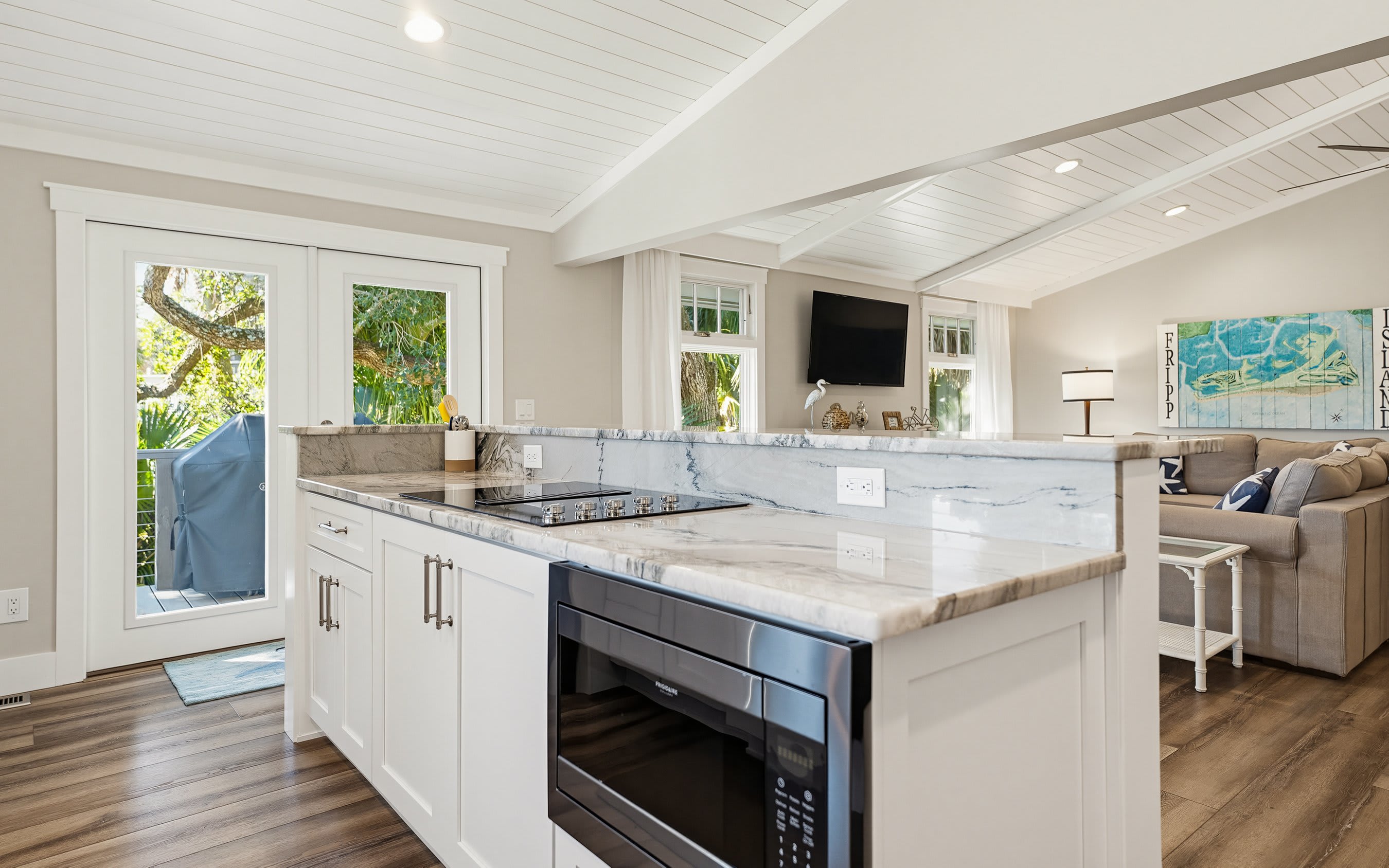 Gourmet Kitchen Overlooking Living Space with Pantry/Laundry Room 
