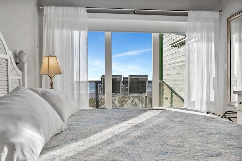 Wake up to ocean views from bed
