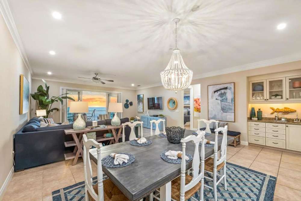 Large open layout living & dining area with dining table for 6 and ocean views!