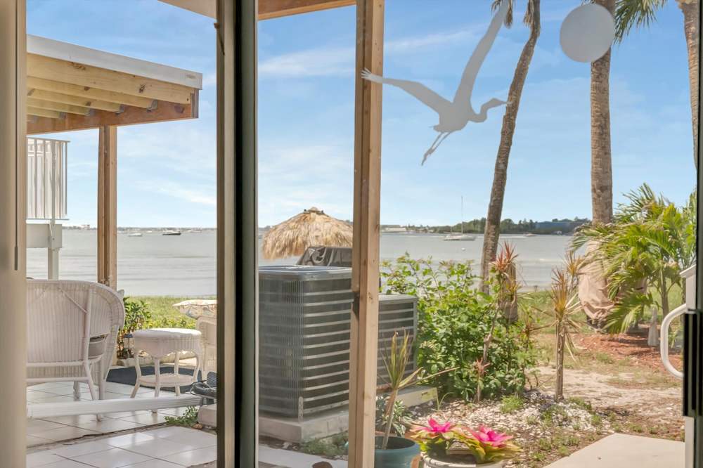 Patio overlooking beach and garden