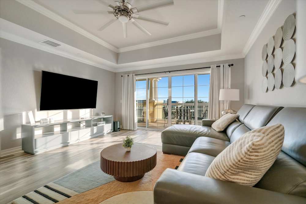 Living room with direct access to the golf-view balcony