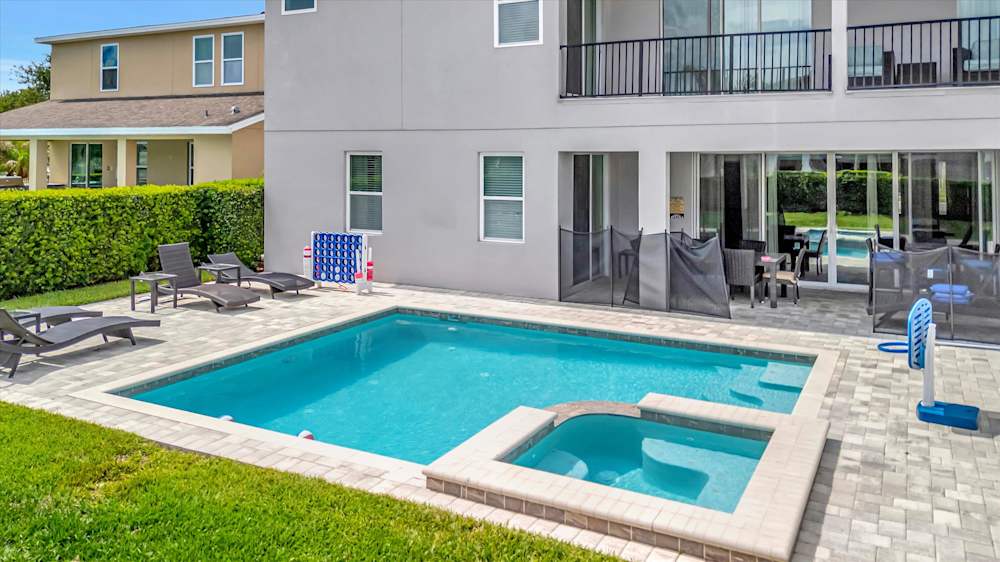 Private pool with attached spillover spa