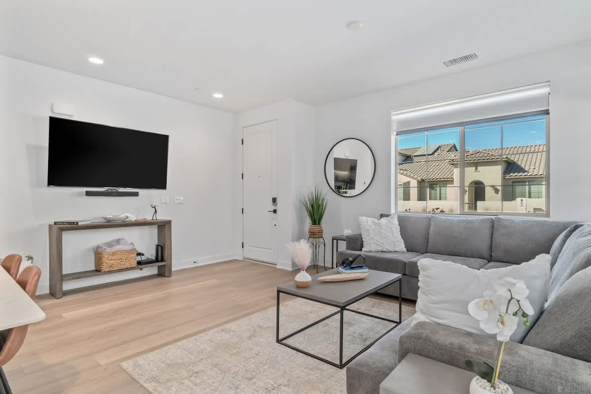 Clean modern lines with gray sectional.