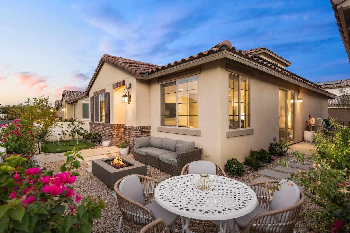 Patio lights create a magical atmosphere as the sun sets.