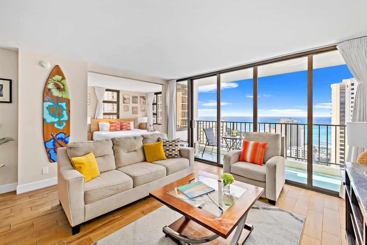 Living room with a pull-out sleeper sofa and beautiful ocean views perfect for relaxation!