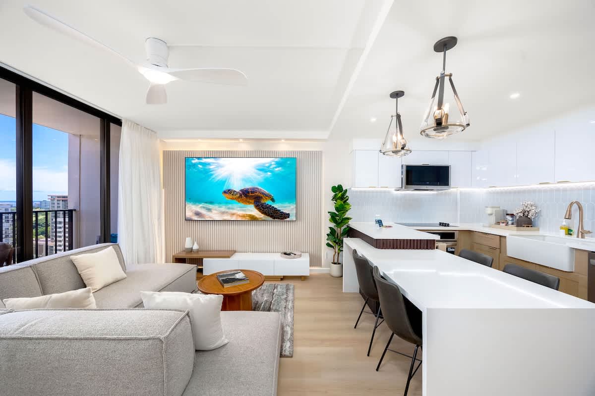 Welcome to your beautifully renovated condo, where the open-concept living, dining, and kitchen area invites you to relax and create unforgettable island memories together.