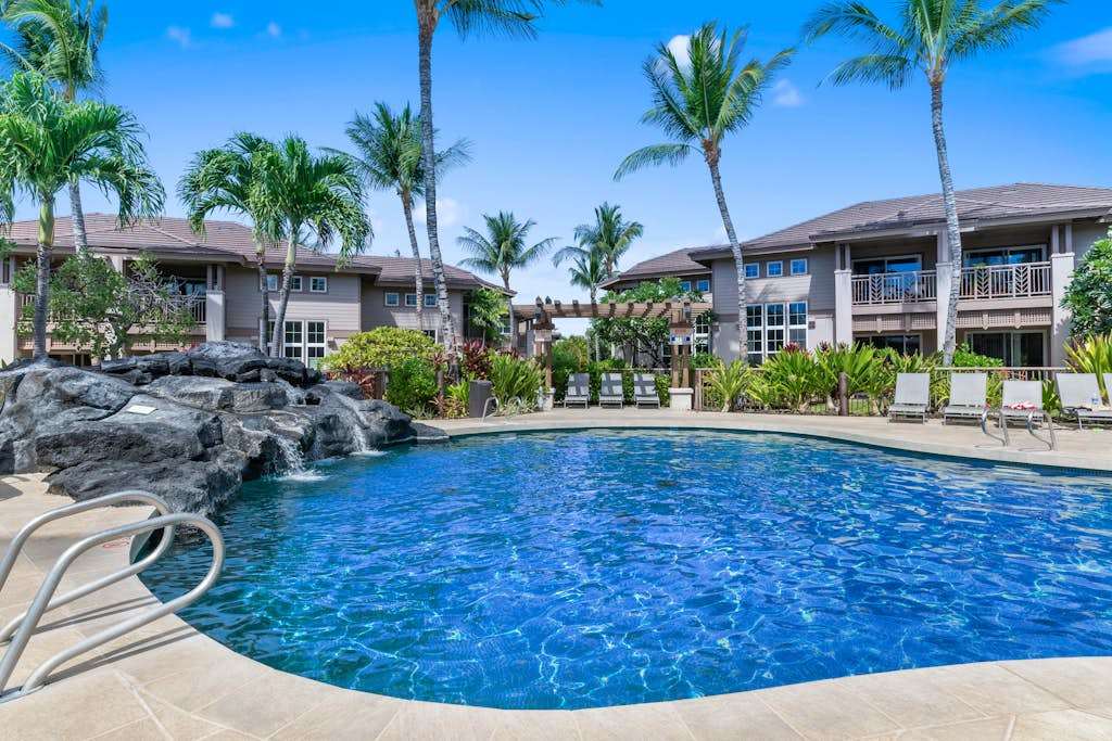 Resort pool with plenty of lounge seating
