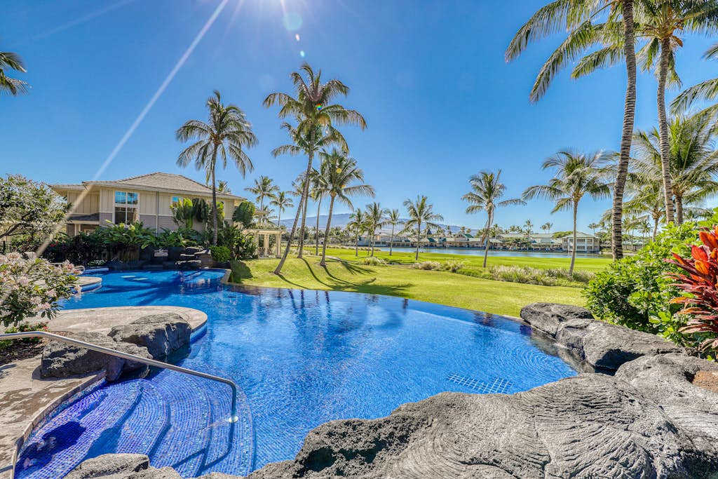 Resort pool with tropical views