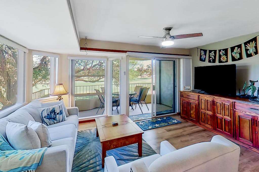 Bright Living Room With Scenic Tree Views