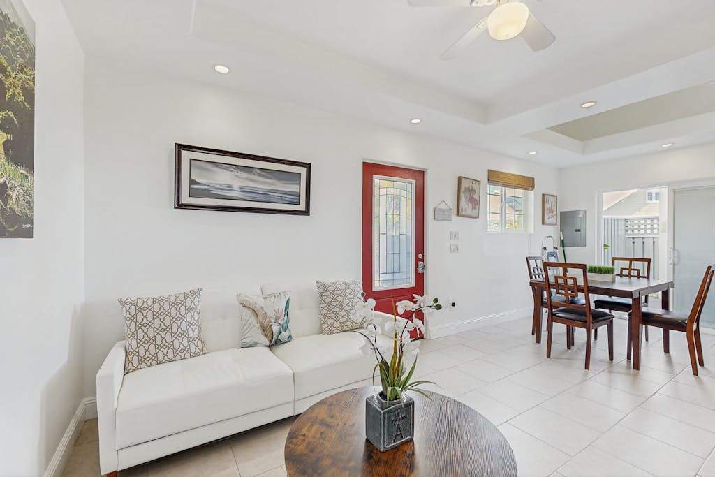 Living room with sofa bed and flat screen tv.  