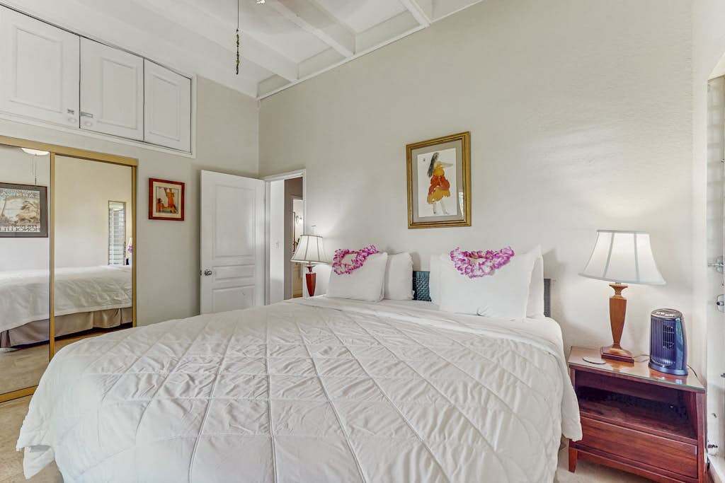 Bright & Restful Bedroom with Comfortable Bed & Mirror Closets