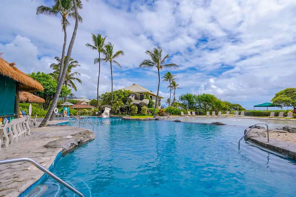 Lounge by the pool with cool island breezes