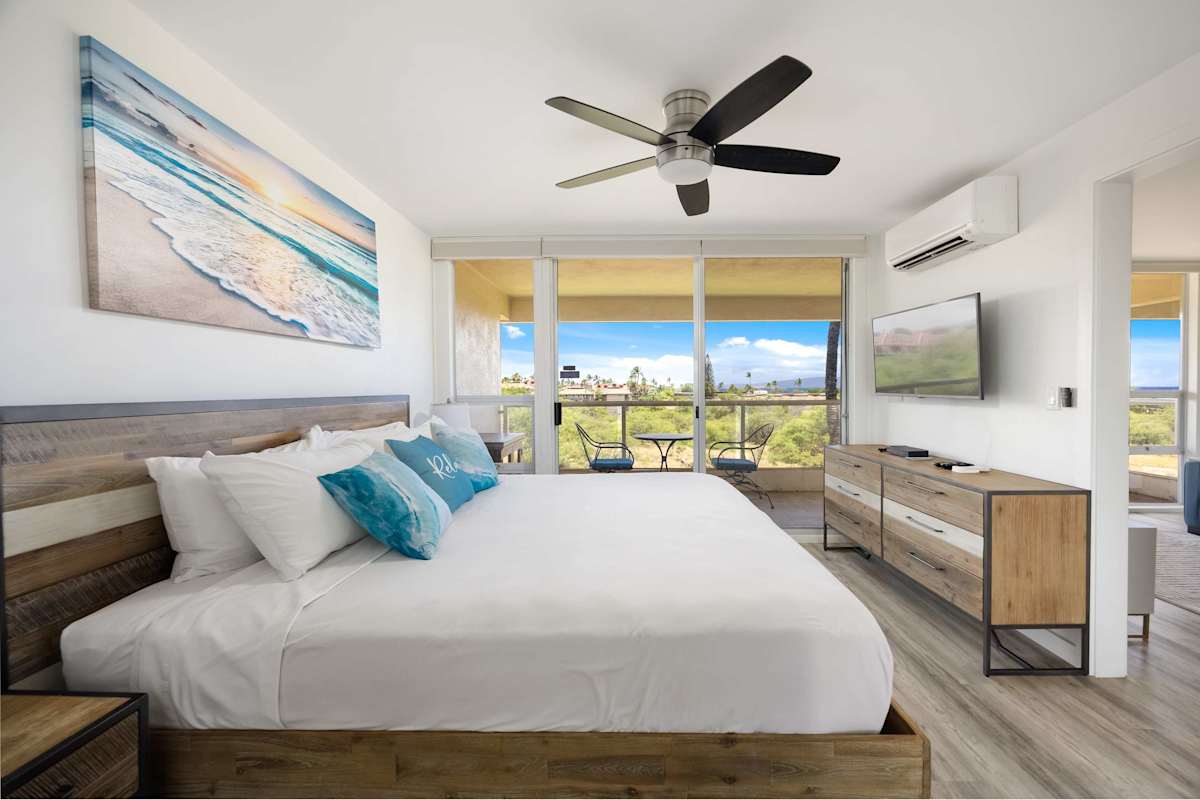 Wake up to tropical vibes in your spacious bedroom featuring a comfortable king bed, cool split A/C, and direct access to your private scenic balcony.
