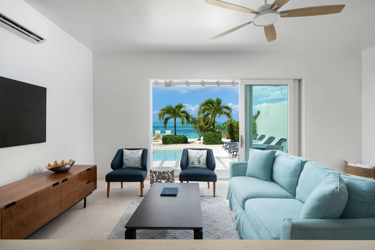 Sandpiper — Living room opening onto the pool terrace