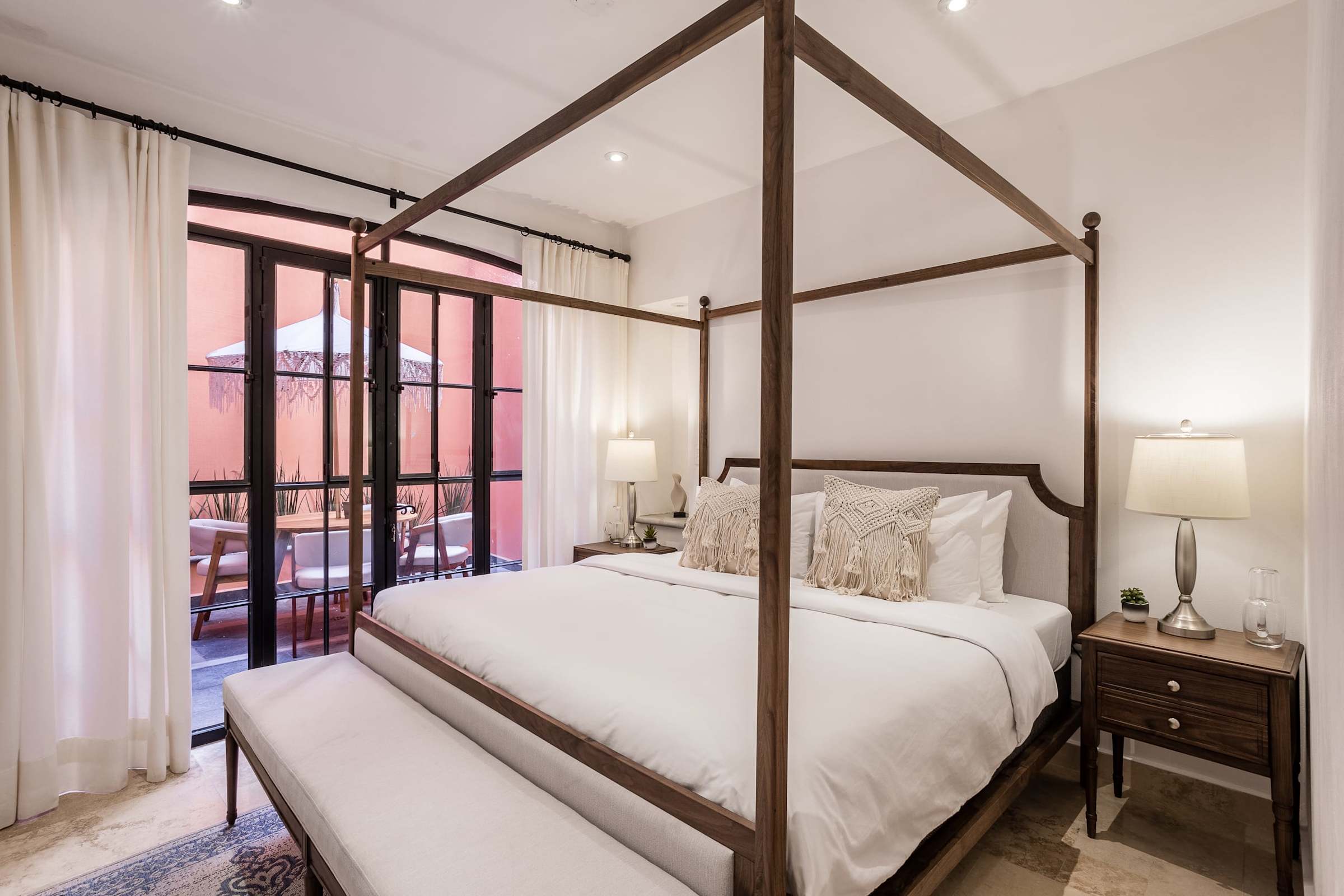 Bedroom with king bed and patio