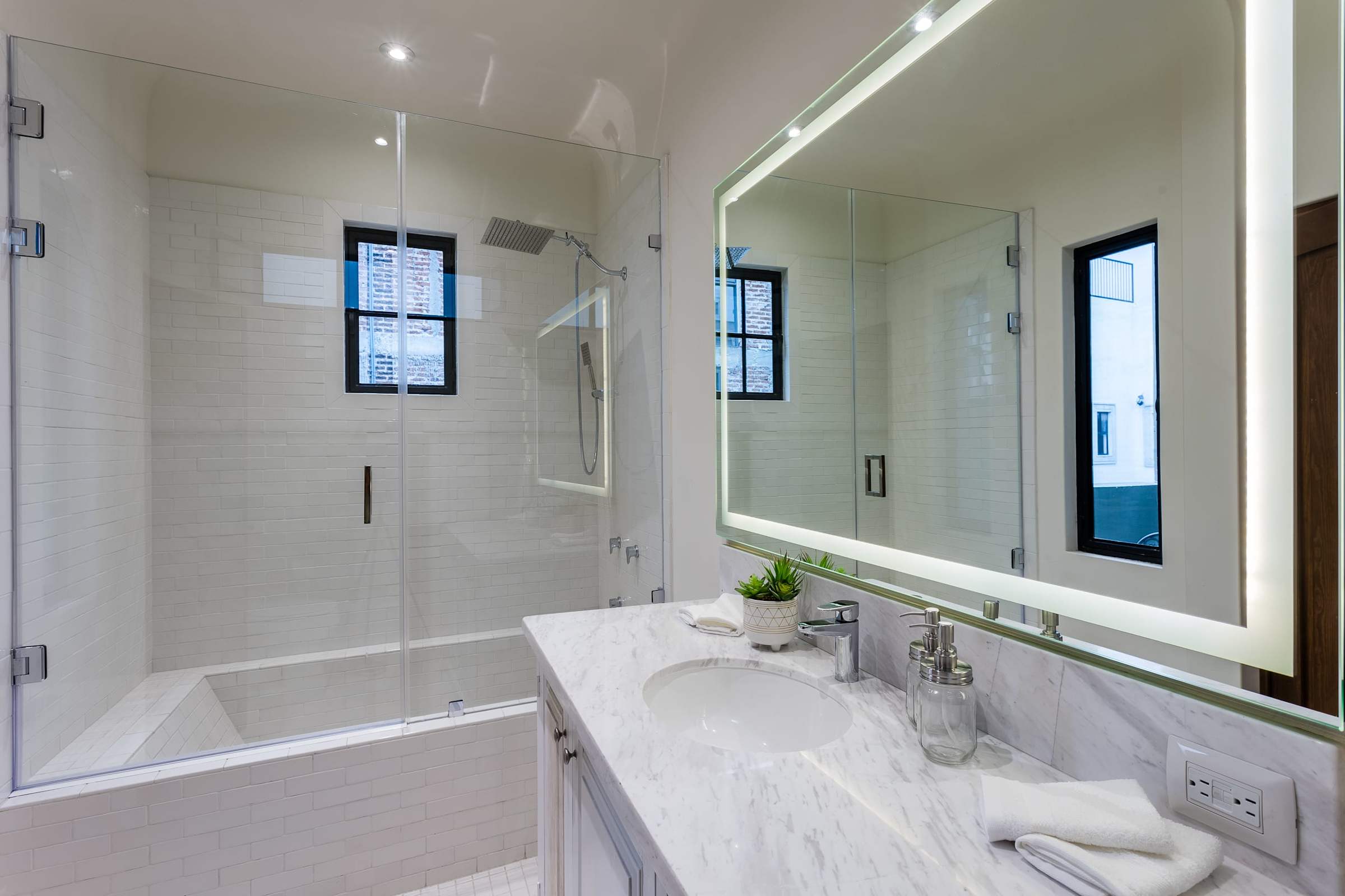 Bathroom with shower and bathtub