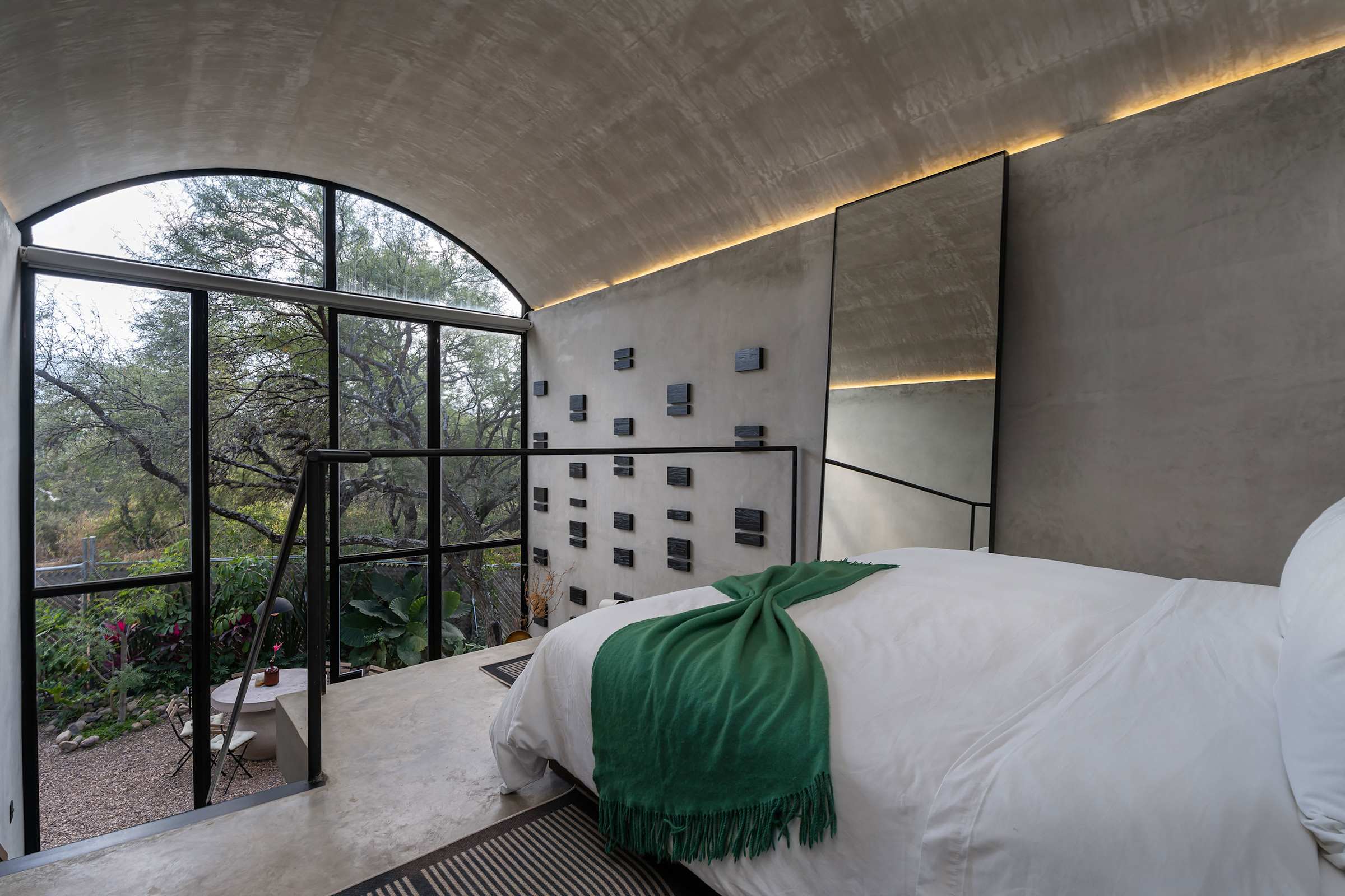 Scenic views from out the glass windows from the loft-style king bedroom.