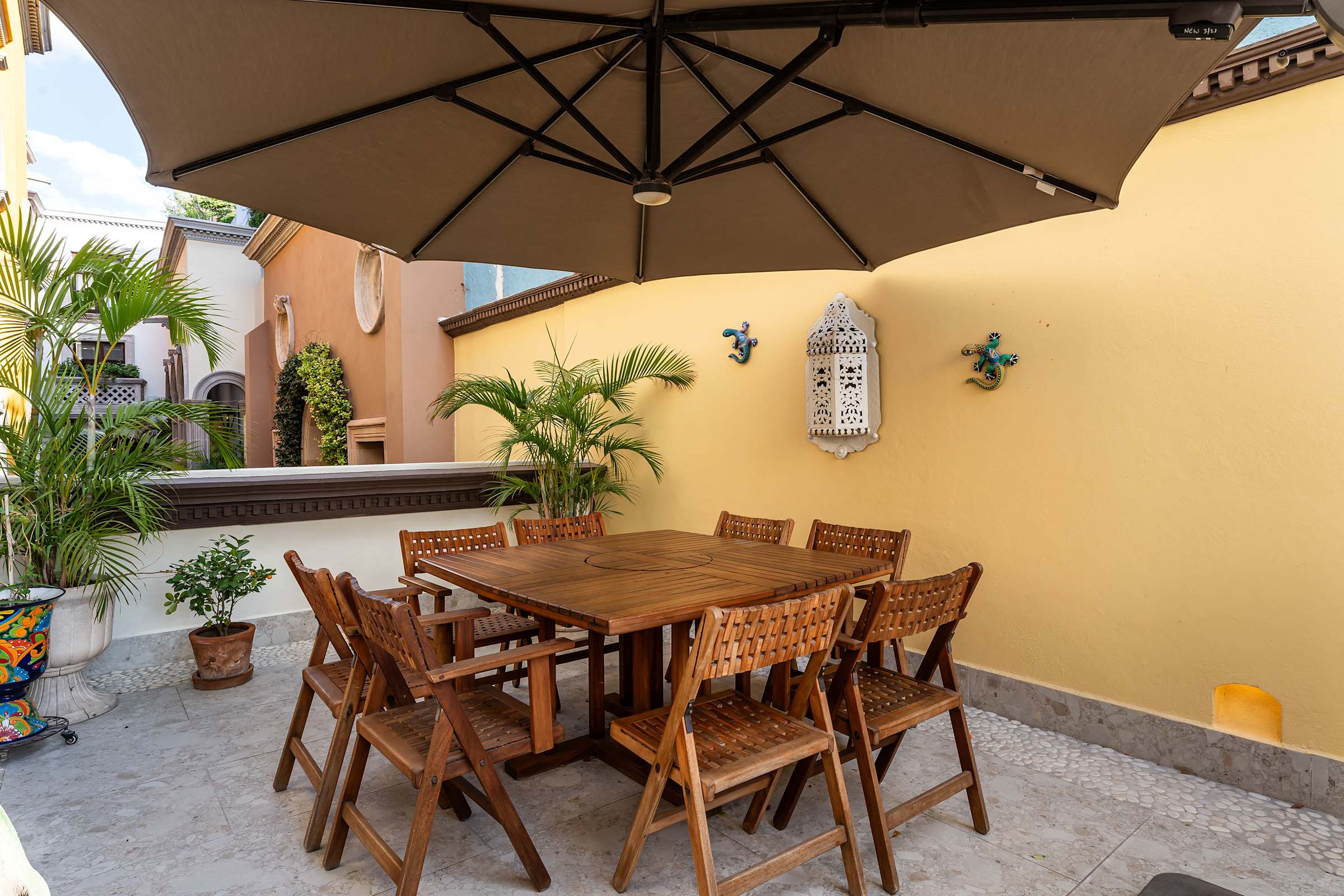 Patio with outdoor dining furniture.