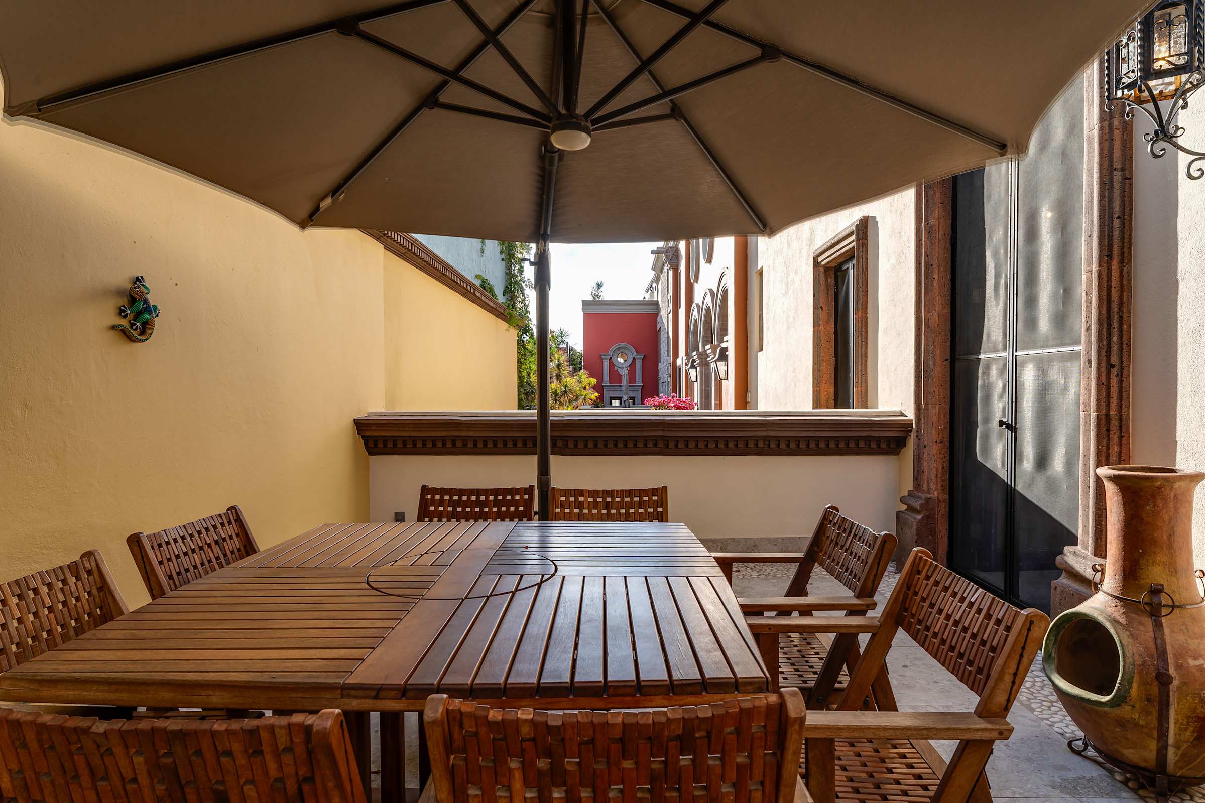 Patio with outdoor dining furniture.
