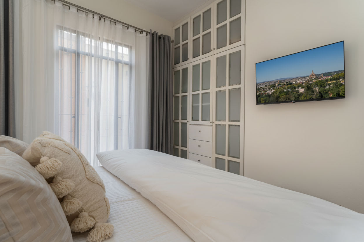 Main bedroom with TV & Closet