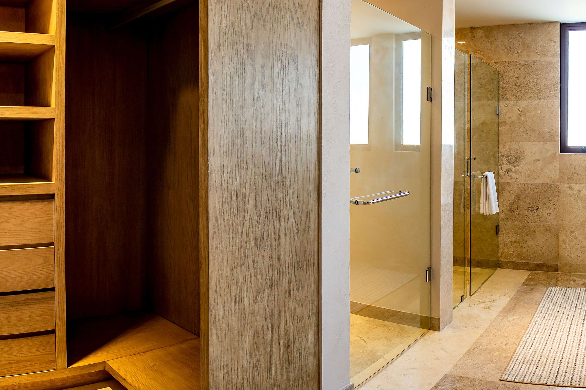 Full Bathroom 5 with a wood-panel vanity, step-in shower, and earthy warm-toned finishes