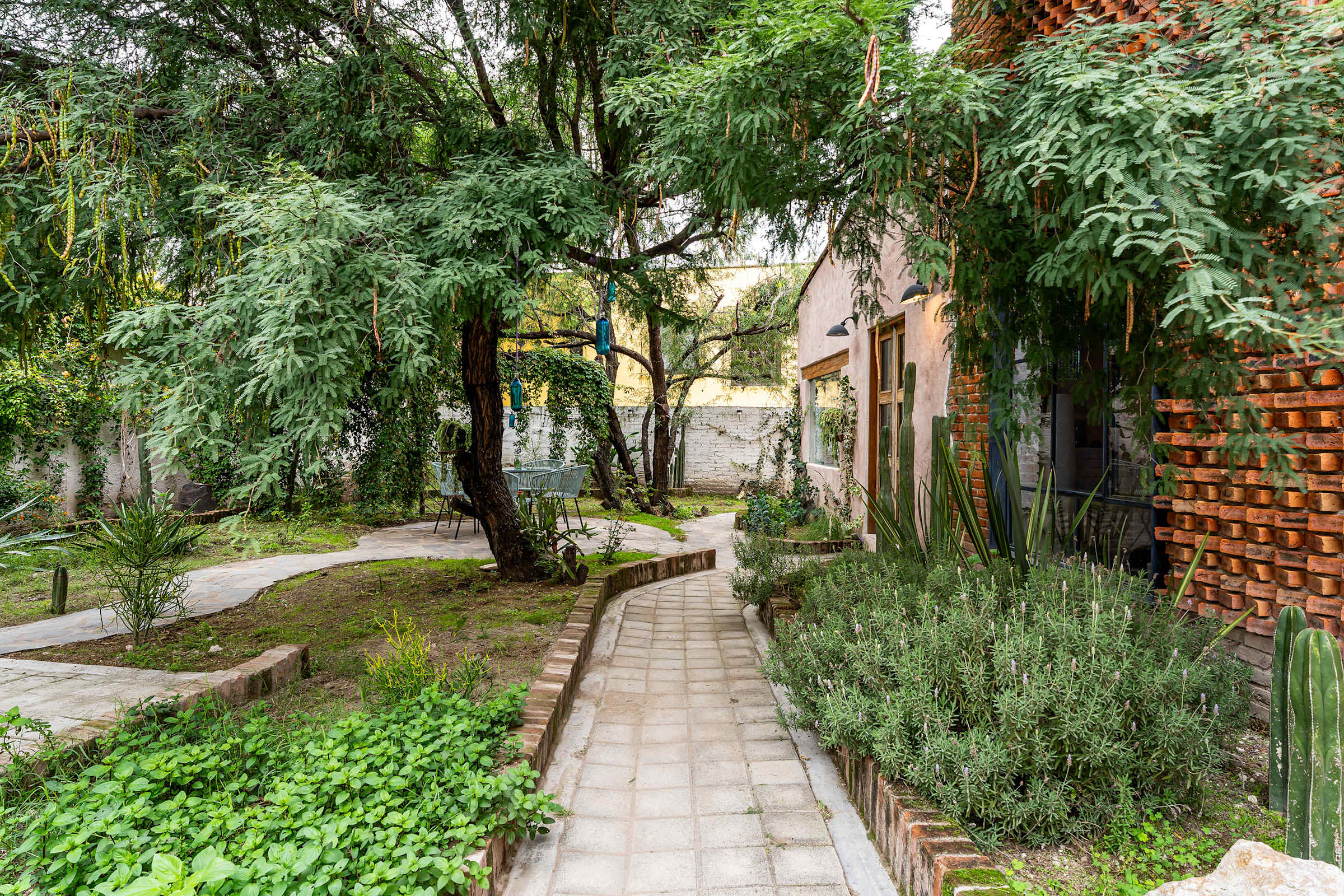 Garden walkway and entrance to the apartment
