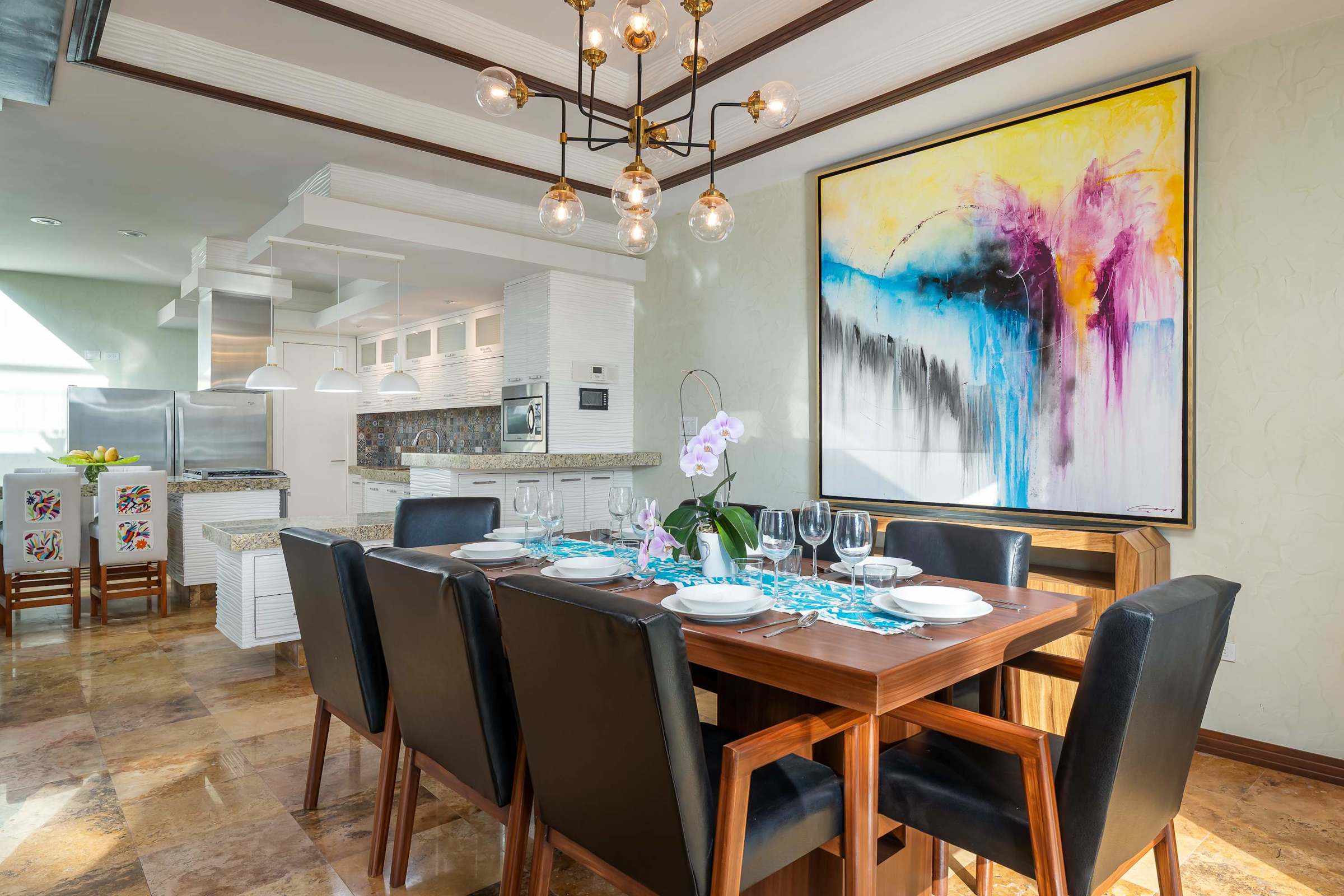 Dining room table with artwork