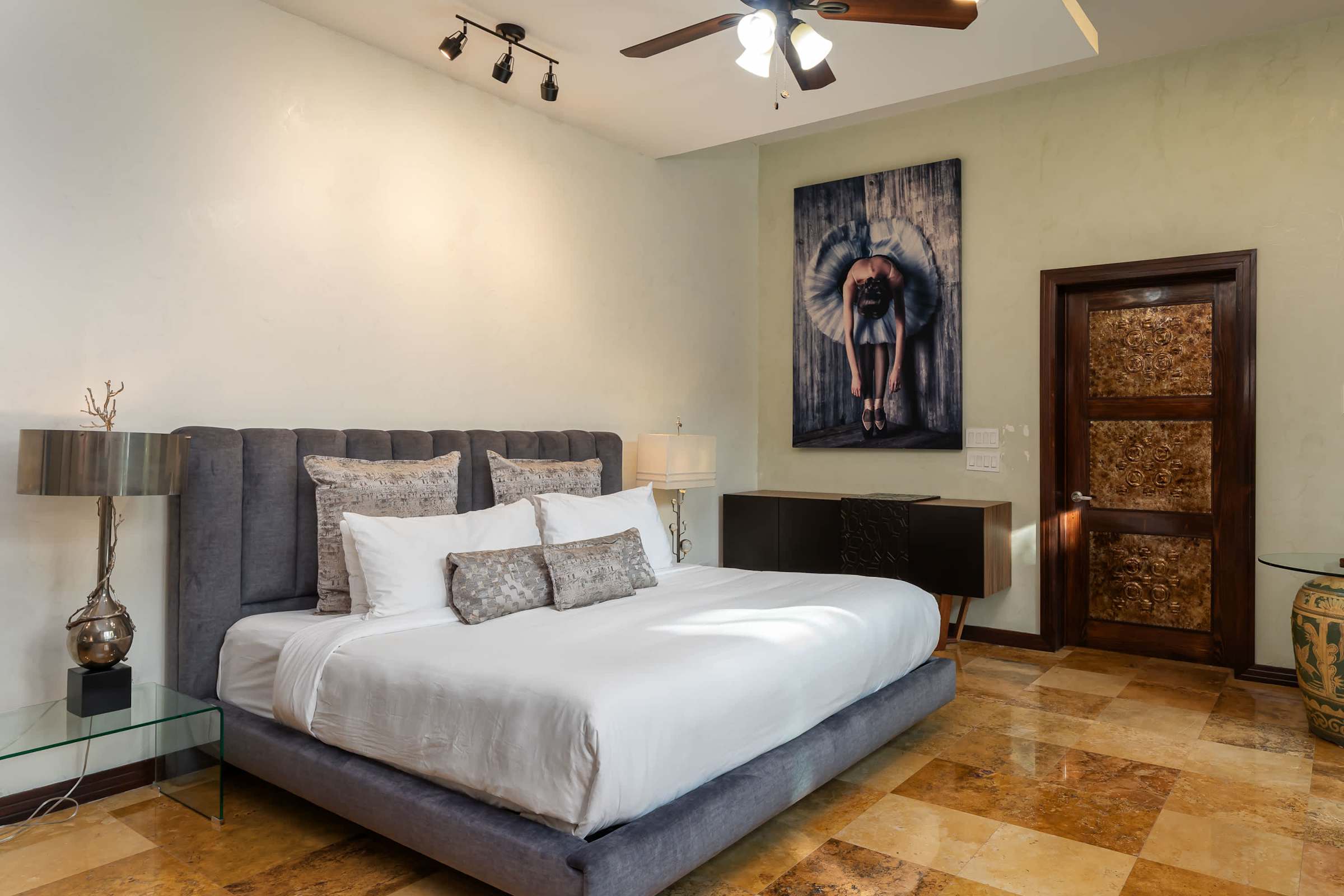 Primary suite bedroom with king bed
