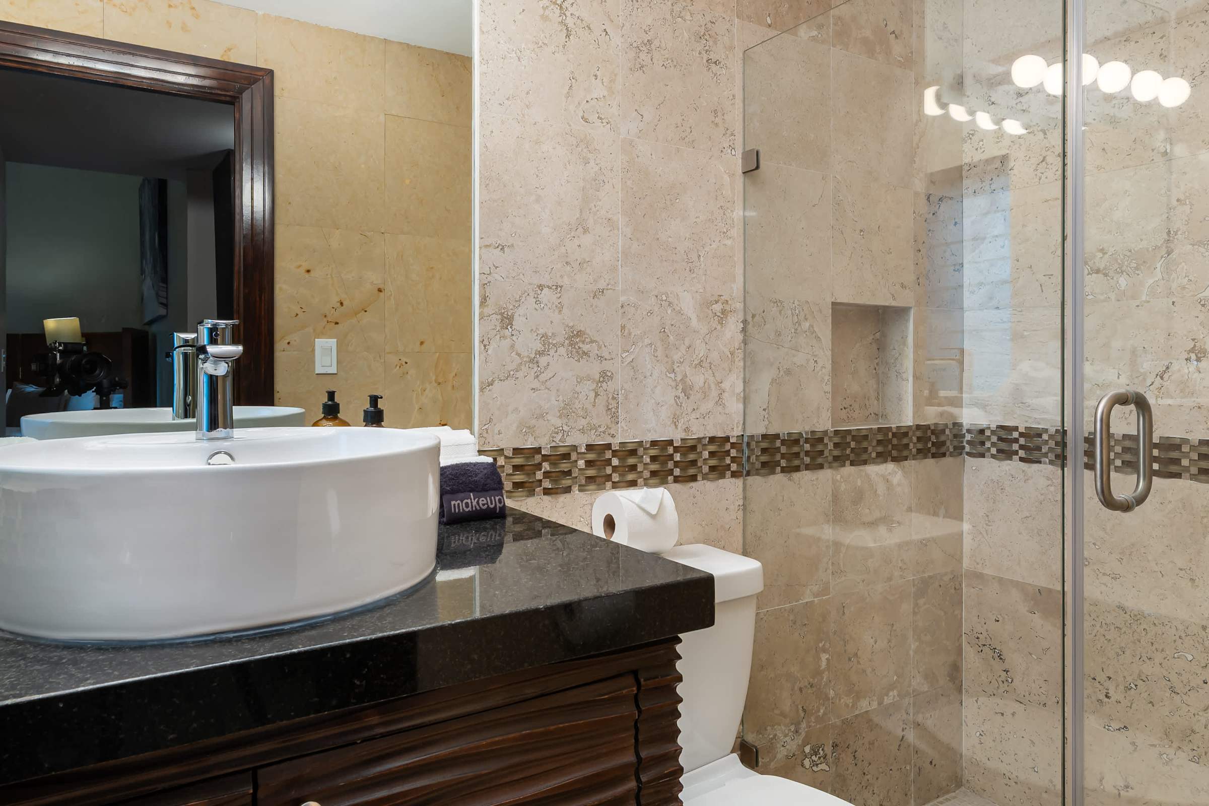 Full bathroom near third bedroom with shower