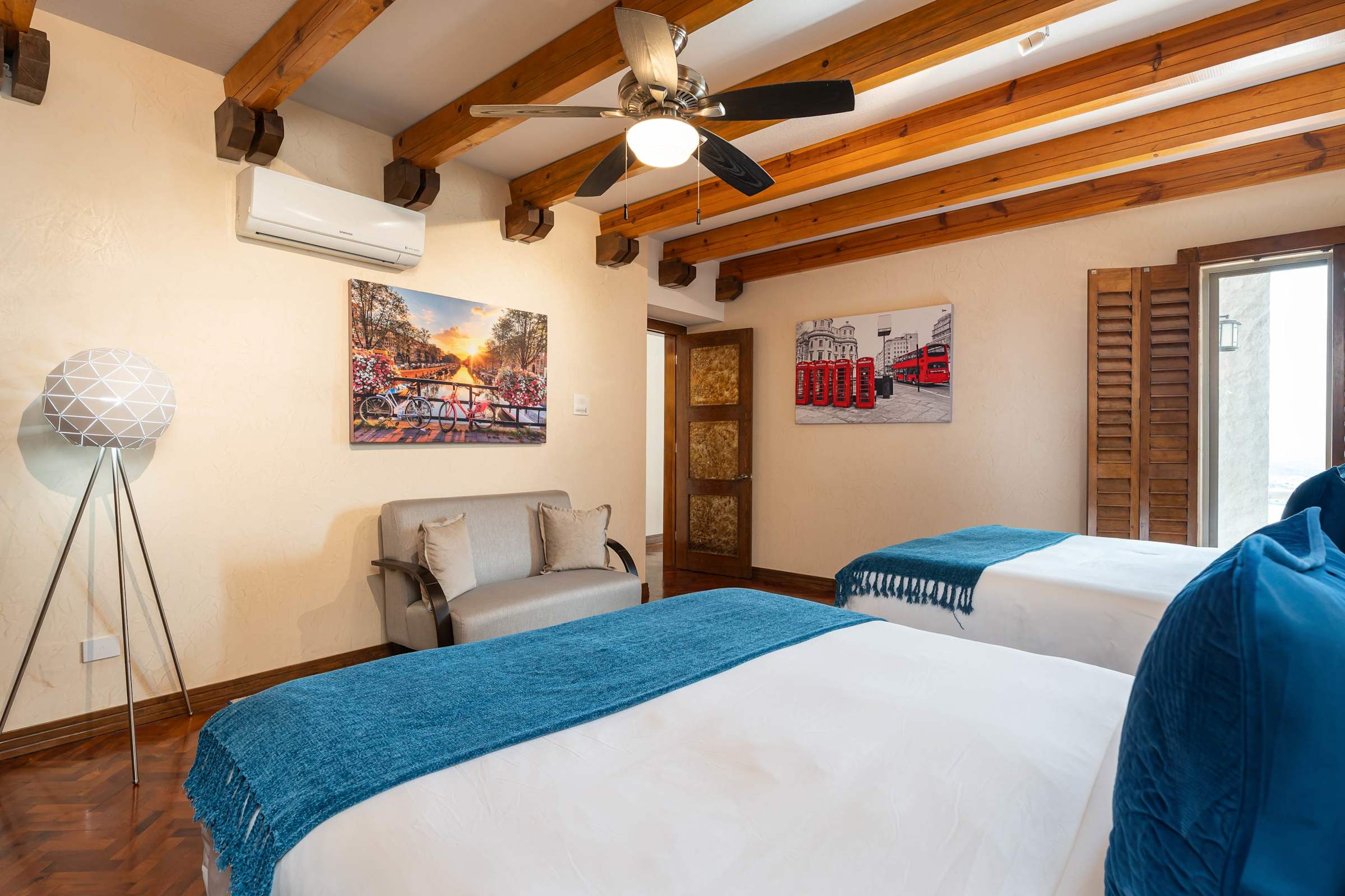 Guest bedroom with local artwork