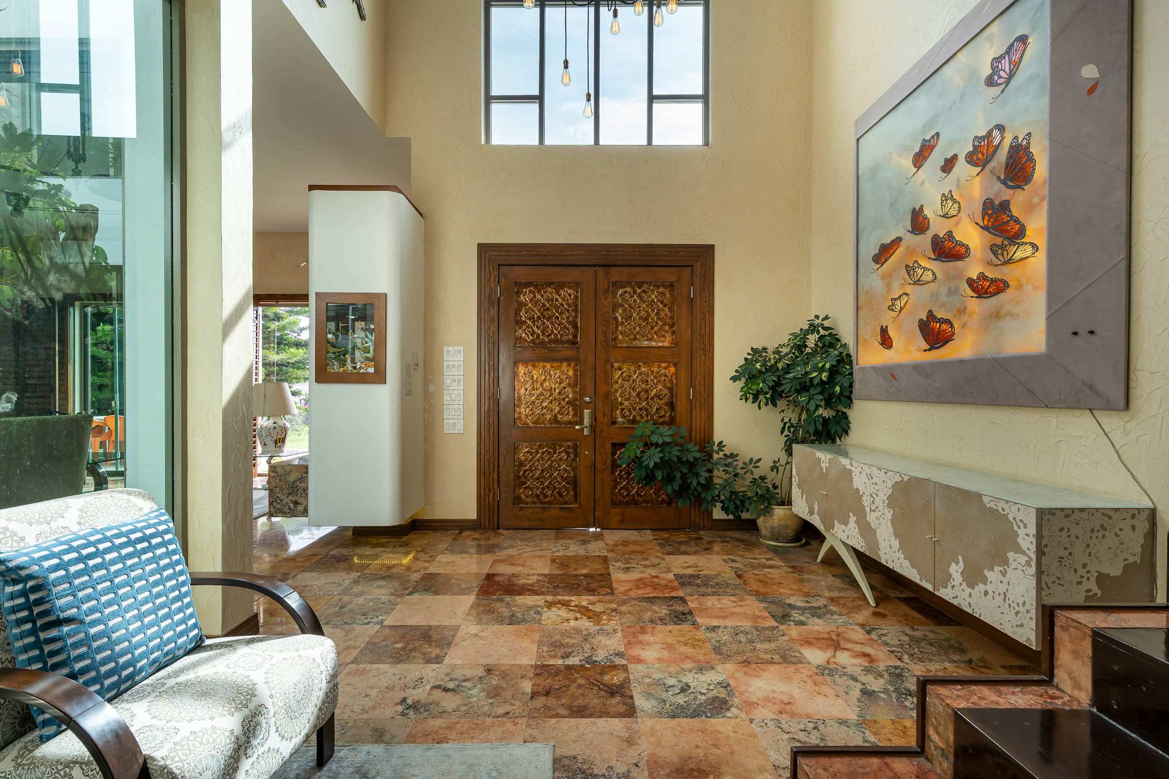 Bright entry foyer with staircase