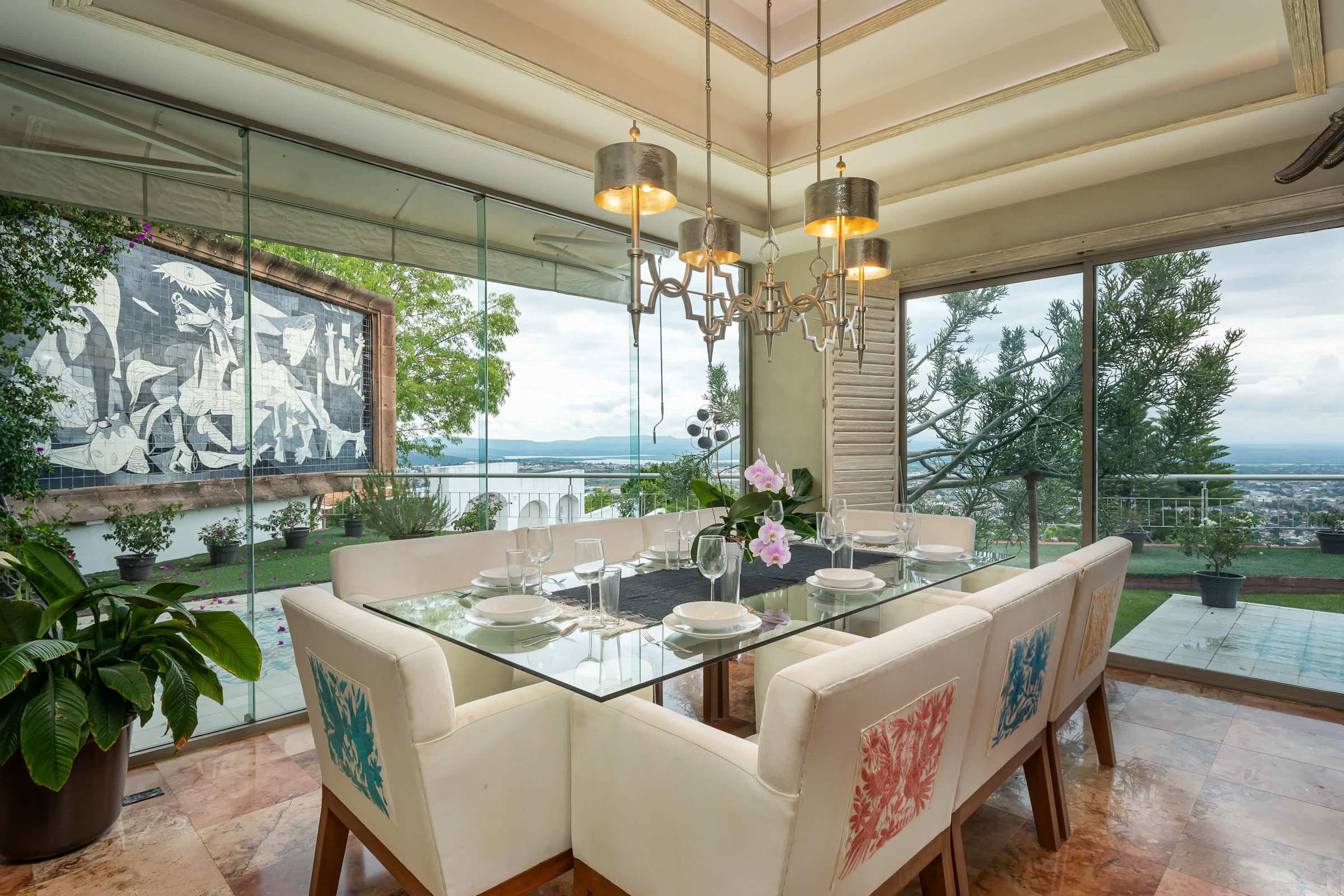 Dining table with garden and city views